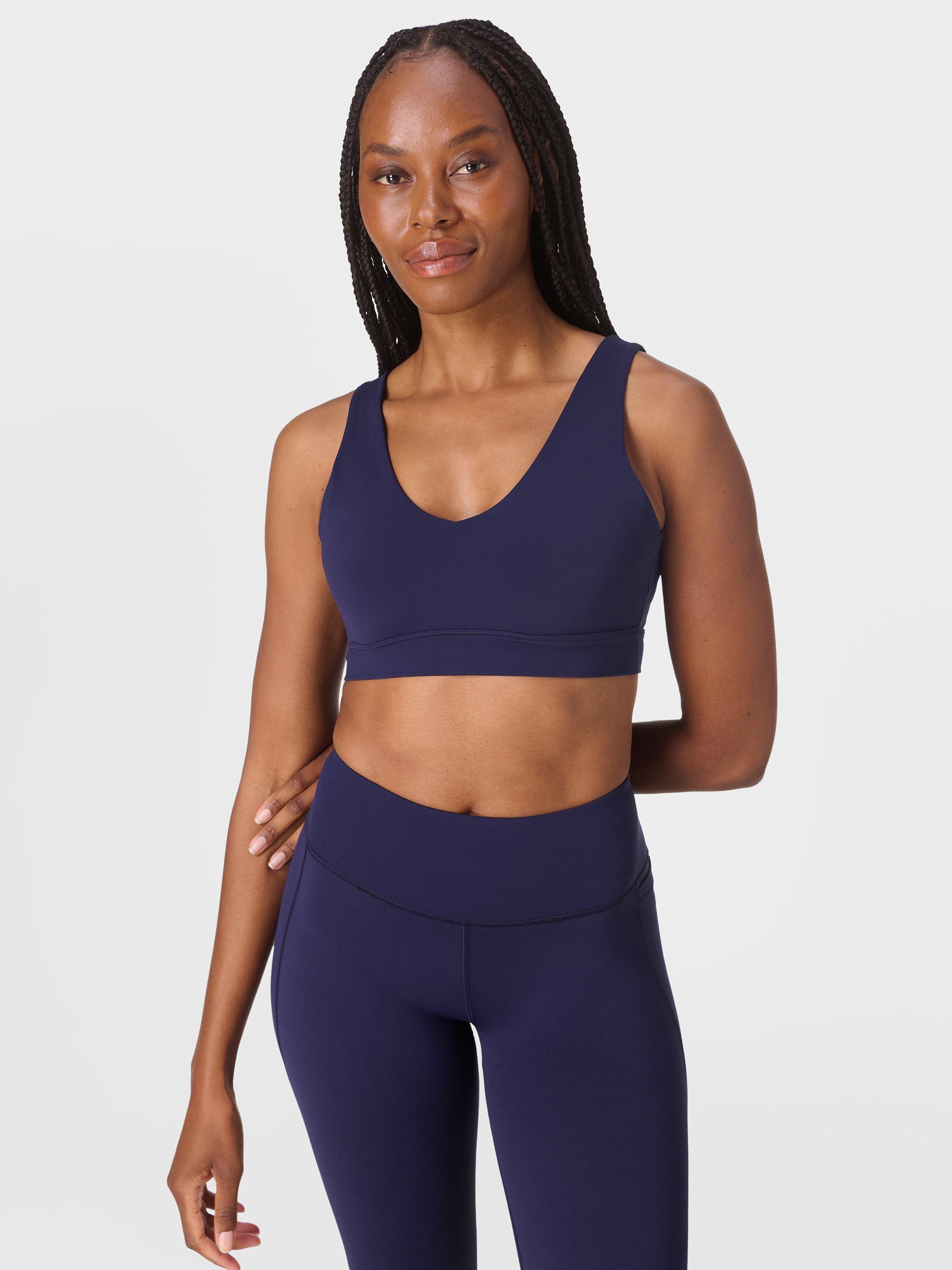 Product image 1 of 9, which shows Sweaty Betty Ultimate Studio Voop Bra, Midnight Navy Blue, XXS