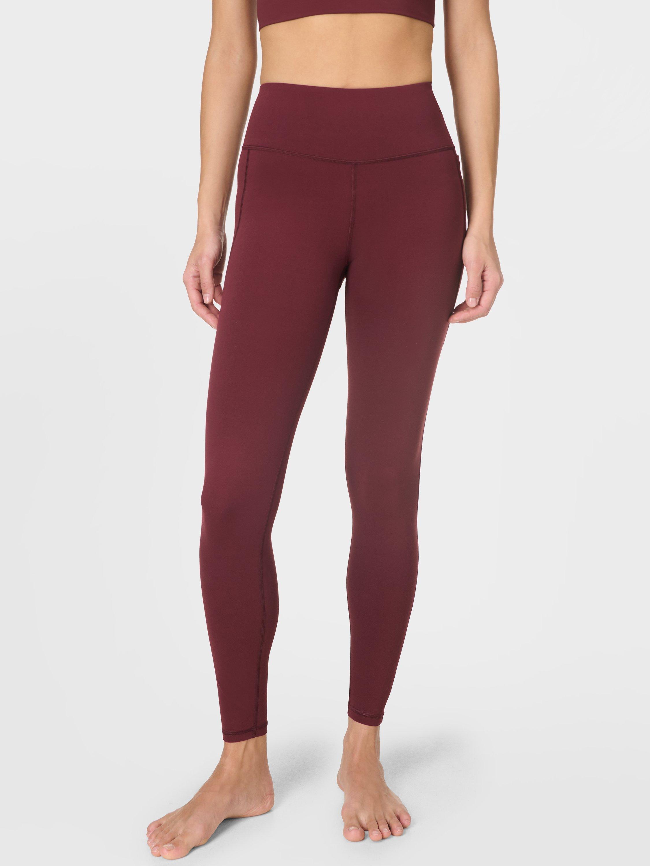 Product image 1 of 8, which shows Sweaty Betty Ultimate Studio Leggings, Garnet Red, M