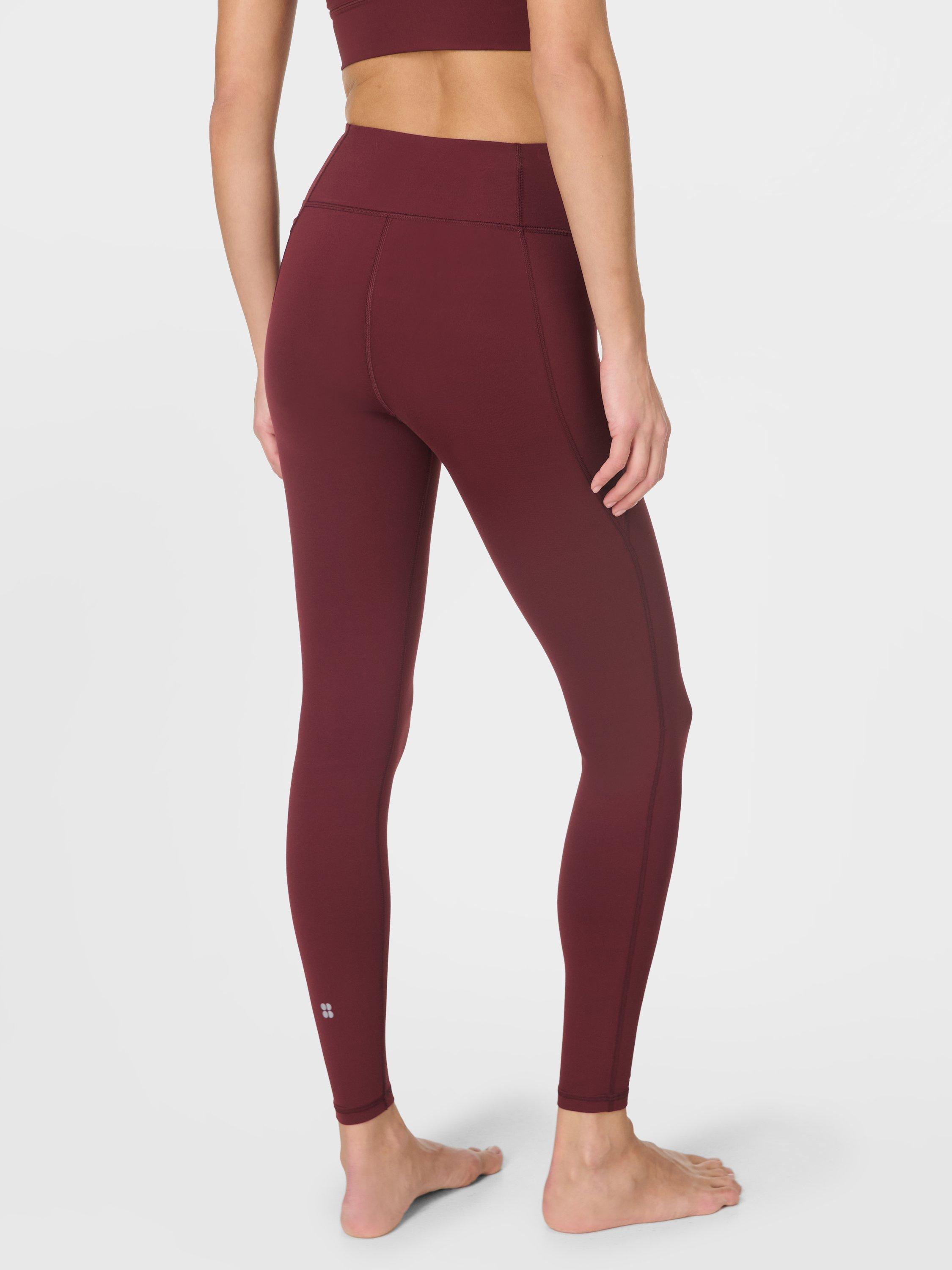 Product image 2 of 8, which shows Sweaty Betty Ultimate Studio Leggings, Garnet Red, M