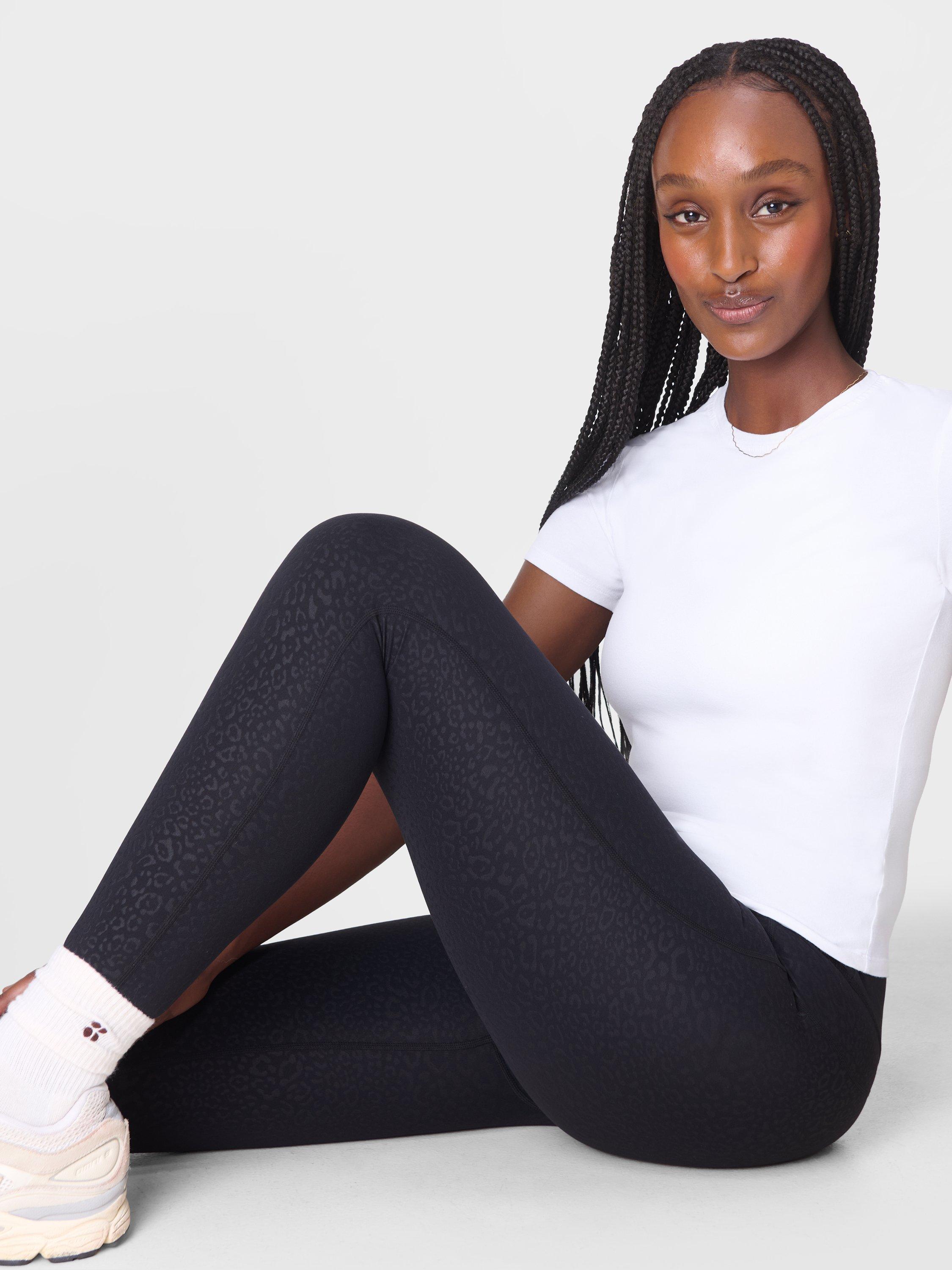 Product image 2 of 9, which shows Sweaty Betty All Day Leggings, Black Leo Spots, XS