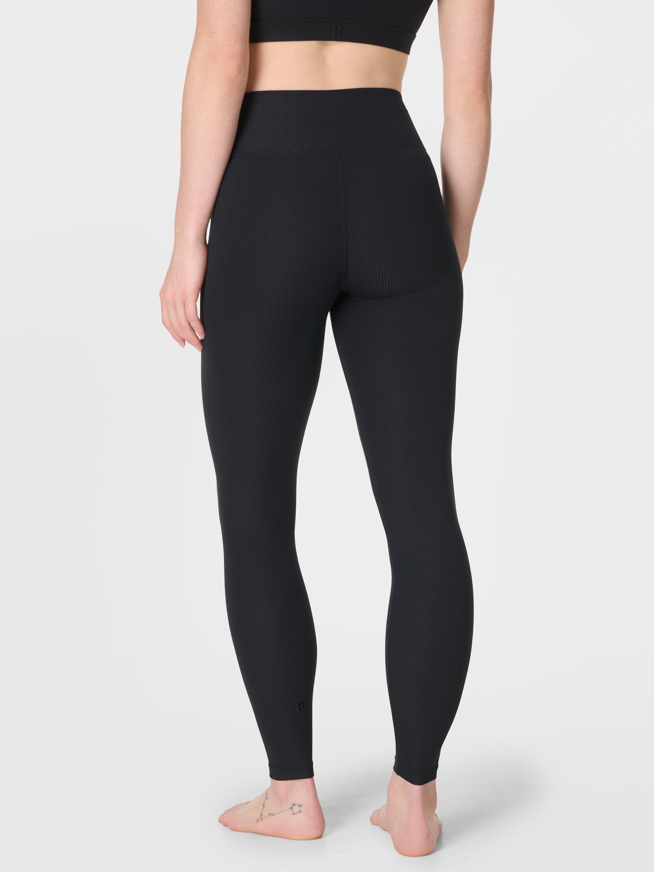 Product image 4 of 8, which shows Sweaty Betty Glow Flex Rib Leggings, Black, XXS