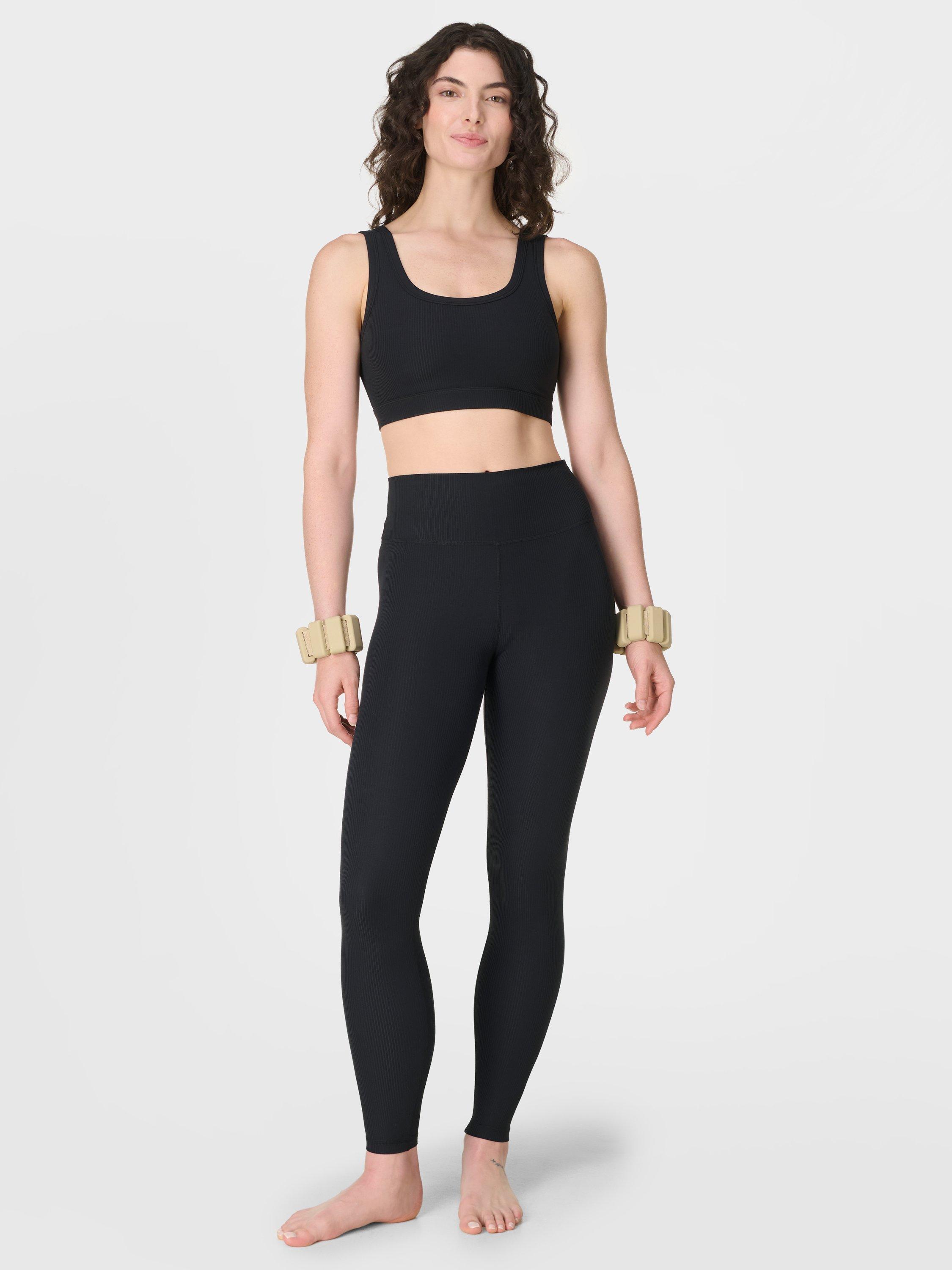 Product image 5 of 8, which shows Sweaty Betty Glow Flex Rib Leggings, Black, XXS