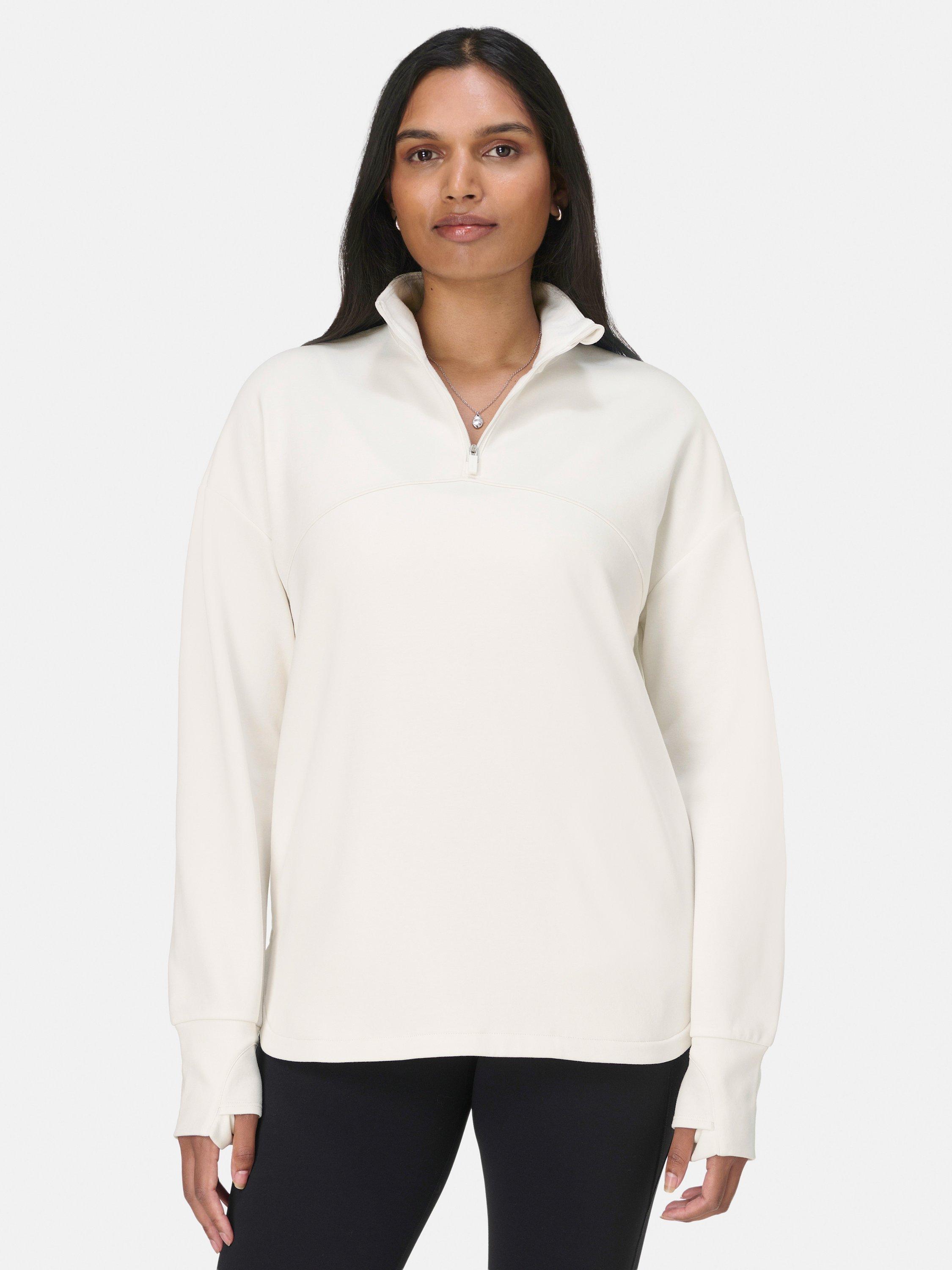 Product image 1 of 7, which shows Sweaty Betty Ultimate Studio Midlayer Top, Lily White, XXS
