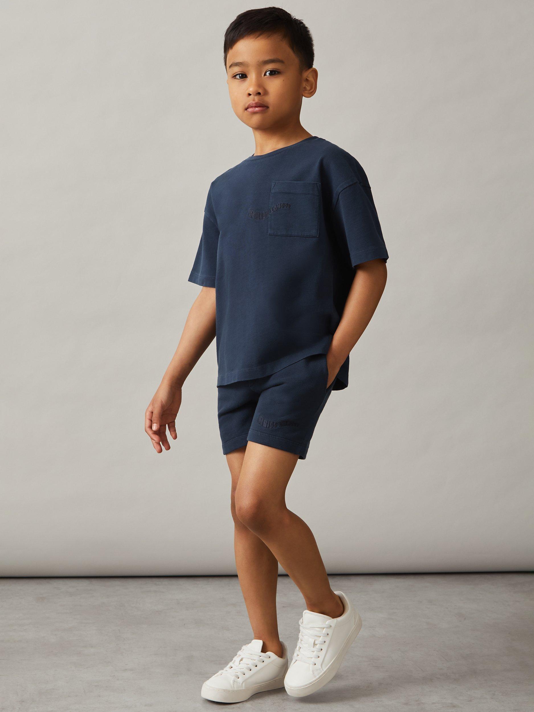 Product image 1 of 4, which shows Reiss Perry Cotton London Palm Washed Shorts, Washed Navy, 3-4 years