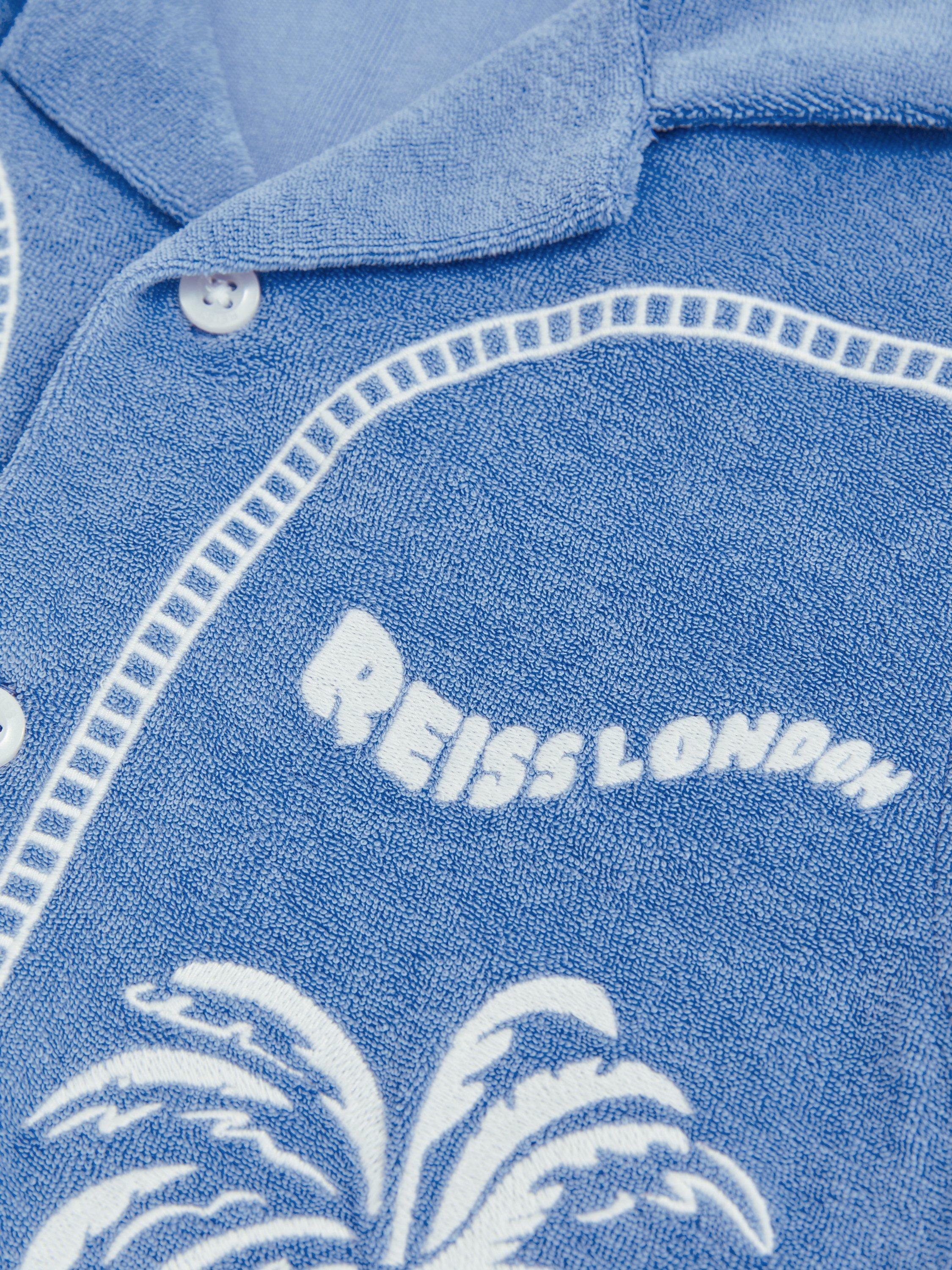 Product image 2 of 5, which shows Reiss Kids' Barnes Towelling Short Sleeve Shirt, Airforce Blue, 3-4 years