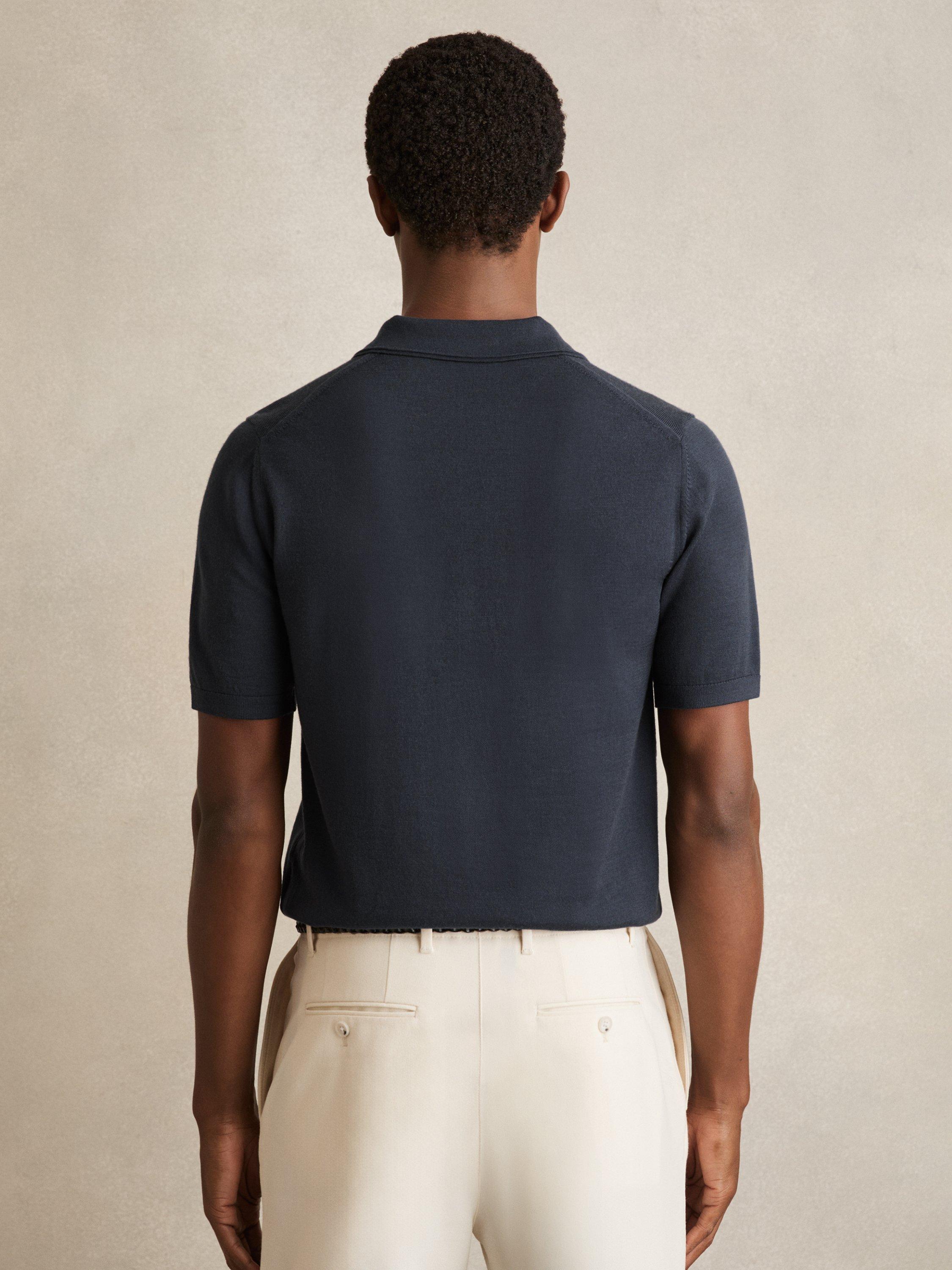 Product image 2 of 5, which shows Reiss Duchie Short Sleeve Open Collar Merino Wool Polo Shirt, Navy, XS