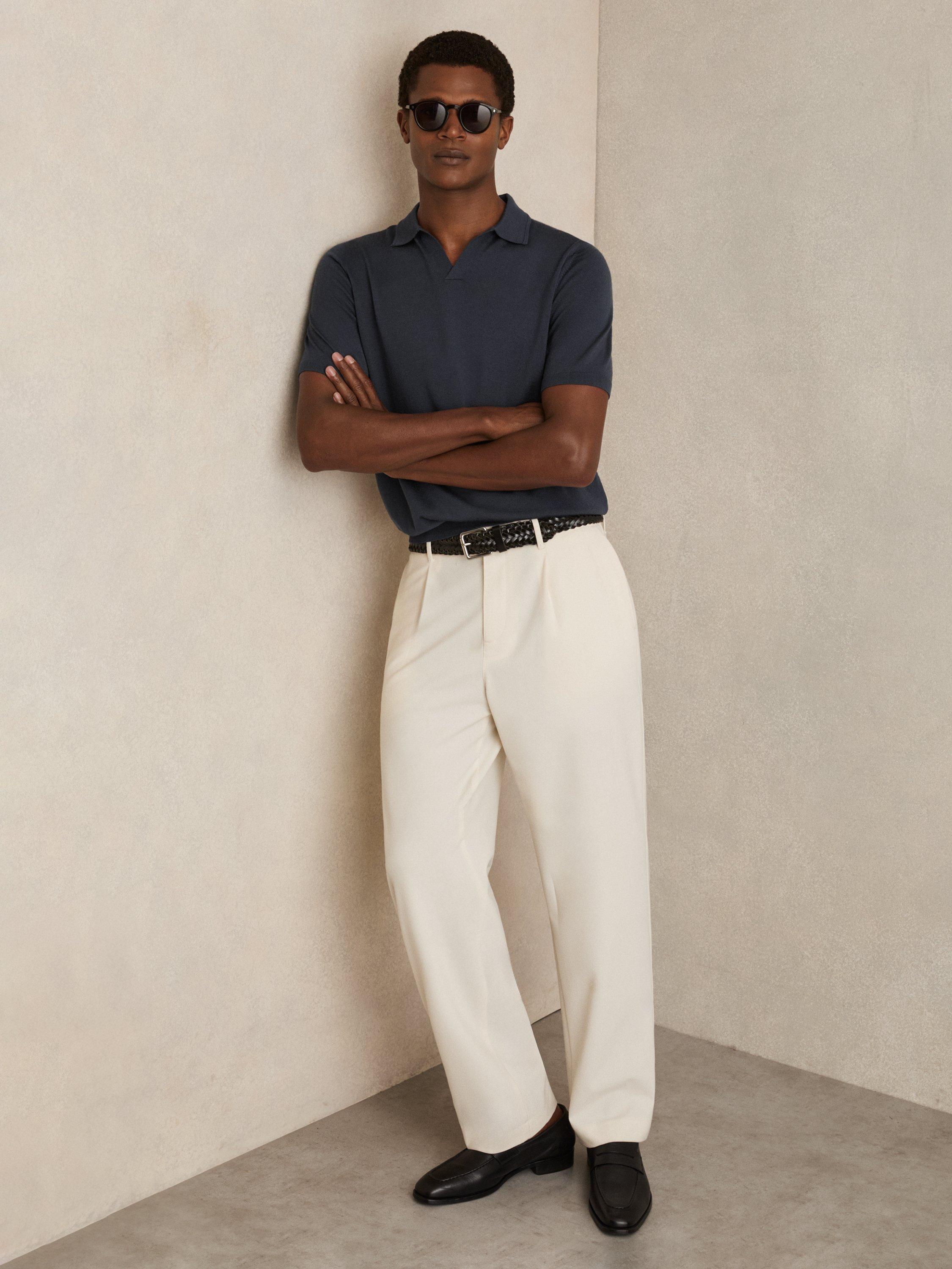 Product image 4 of 5, which shows Reiss Duchie Short Sleeve Open Collar Merino Wool Polo Shirt, Navy, XS