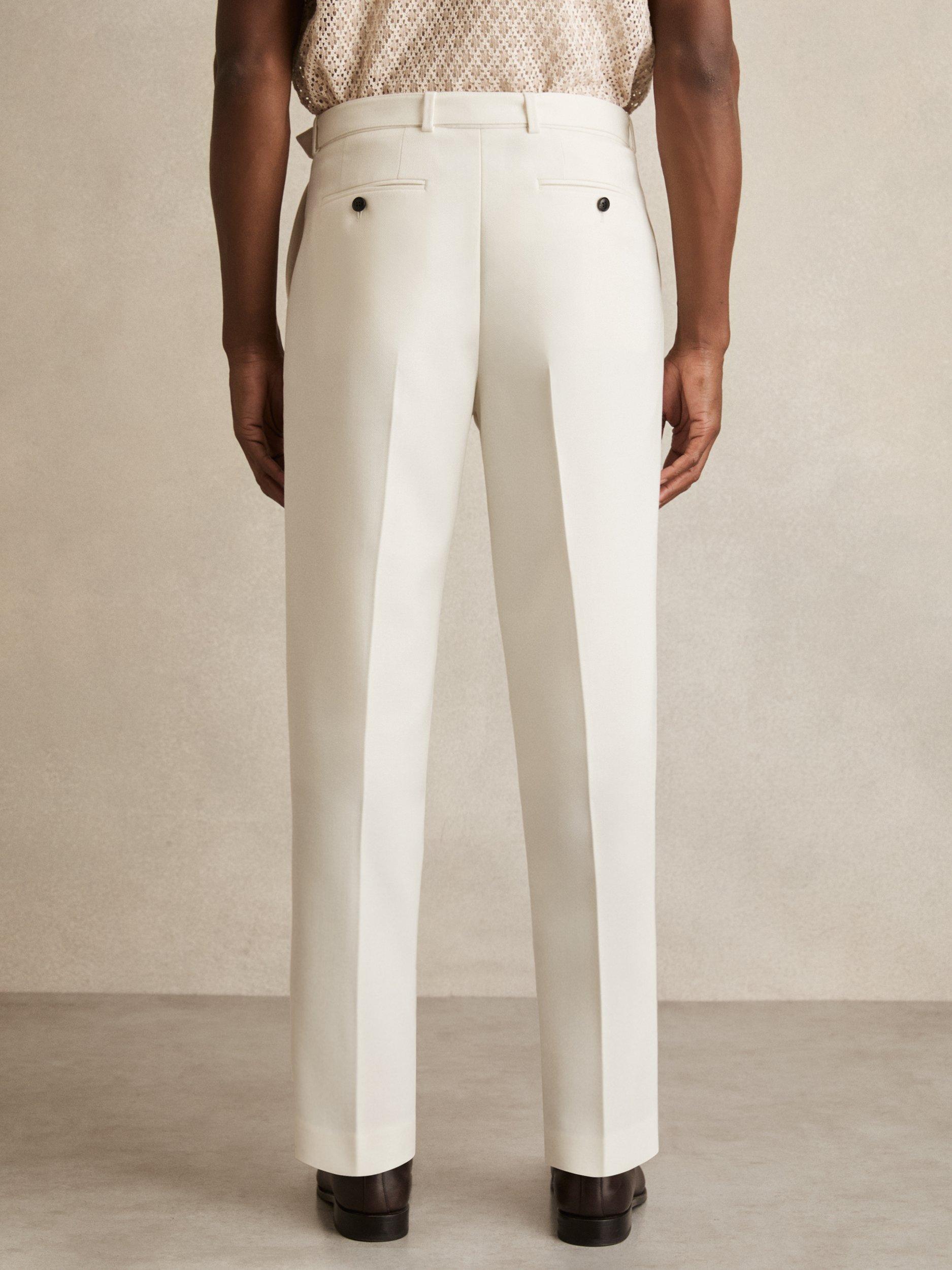 Product image 2 of 5, which shows Reiss Strap Wool Blend Tapered Trousers, White, 30R