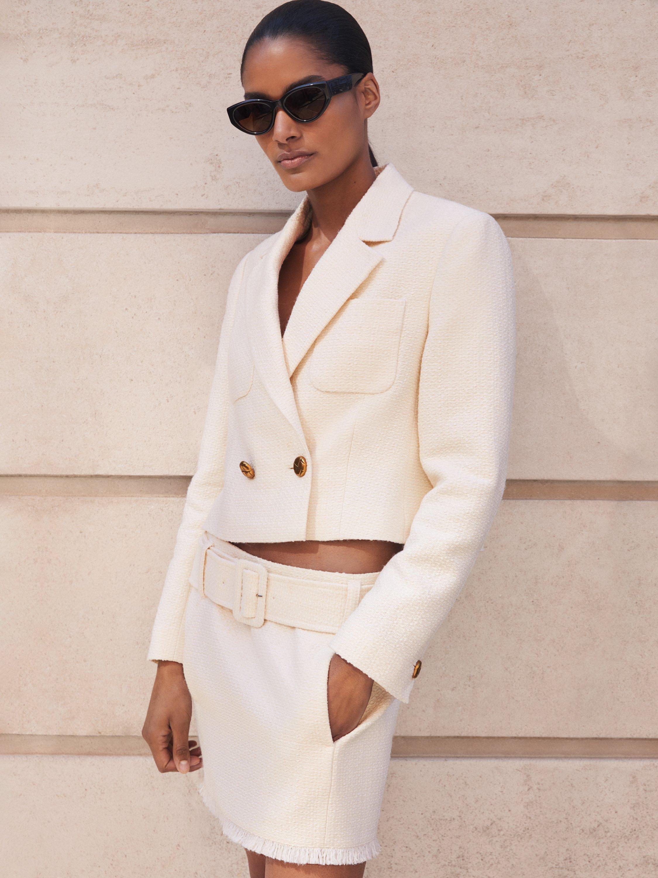 Product image 1 of 5, which shows Reiss Mia Wool Blend Belted Mini Skirt, White, 6