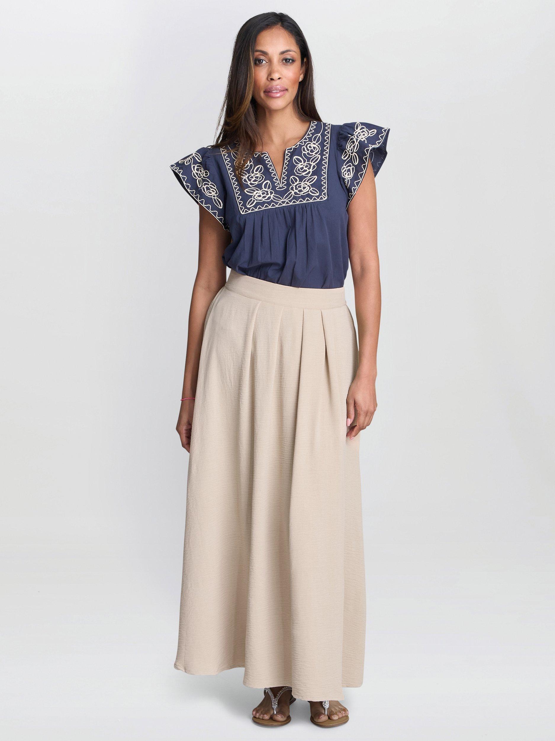 Product image 1 of 3, which shows Gina Bacconi Cressa Embroidered Flutter Sleeve Top, Navy, L-XL