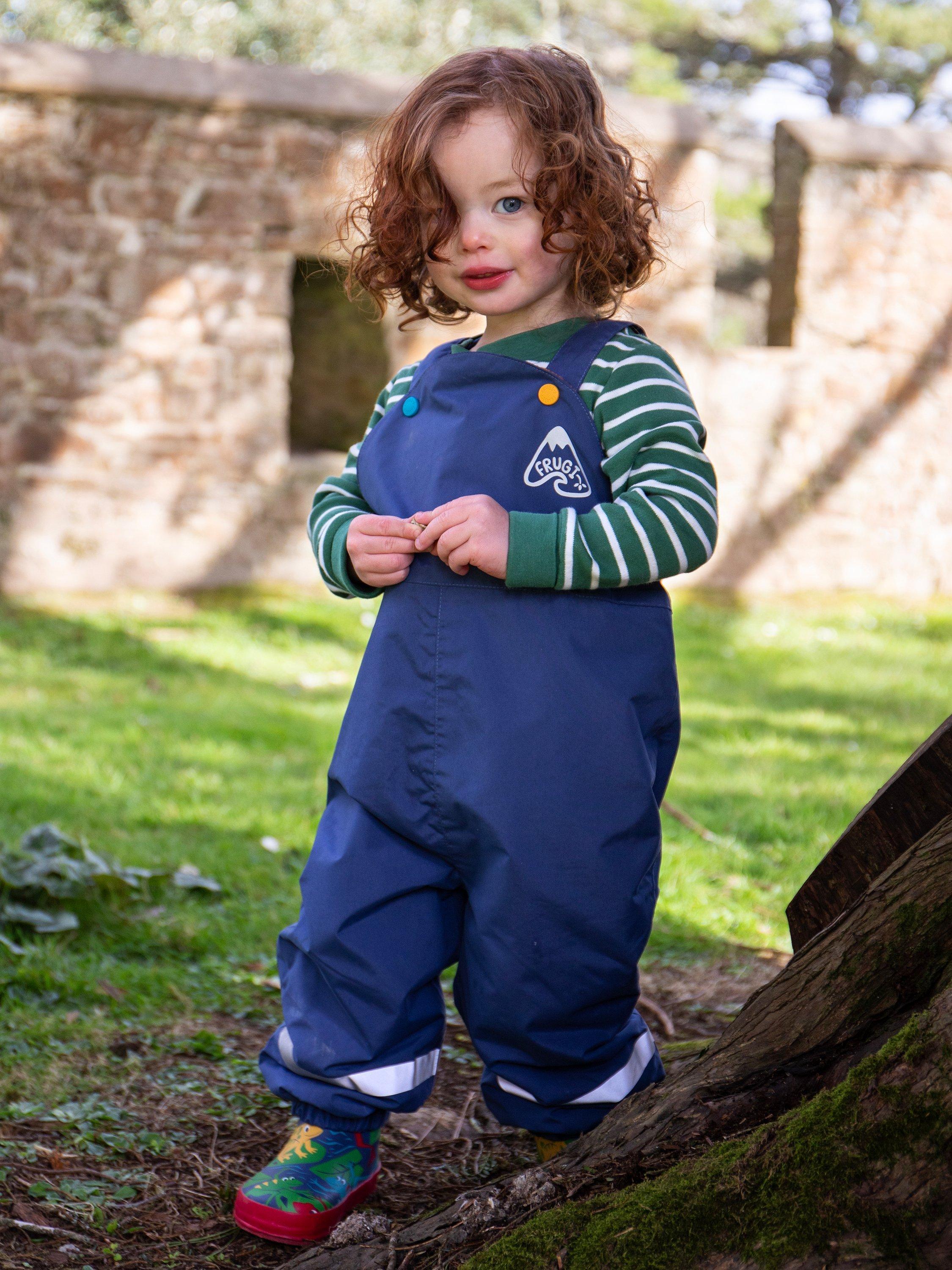 Product image 2 of 6, which shows Frugi's Little Waterproof Dungarees, Navy Blue, 6-9 months