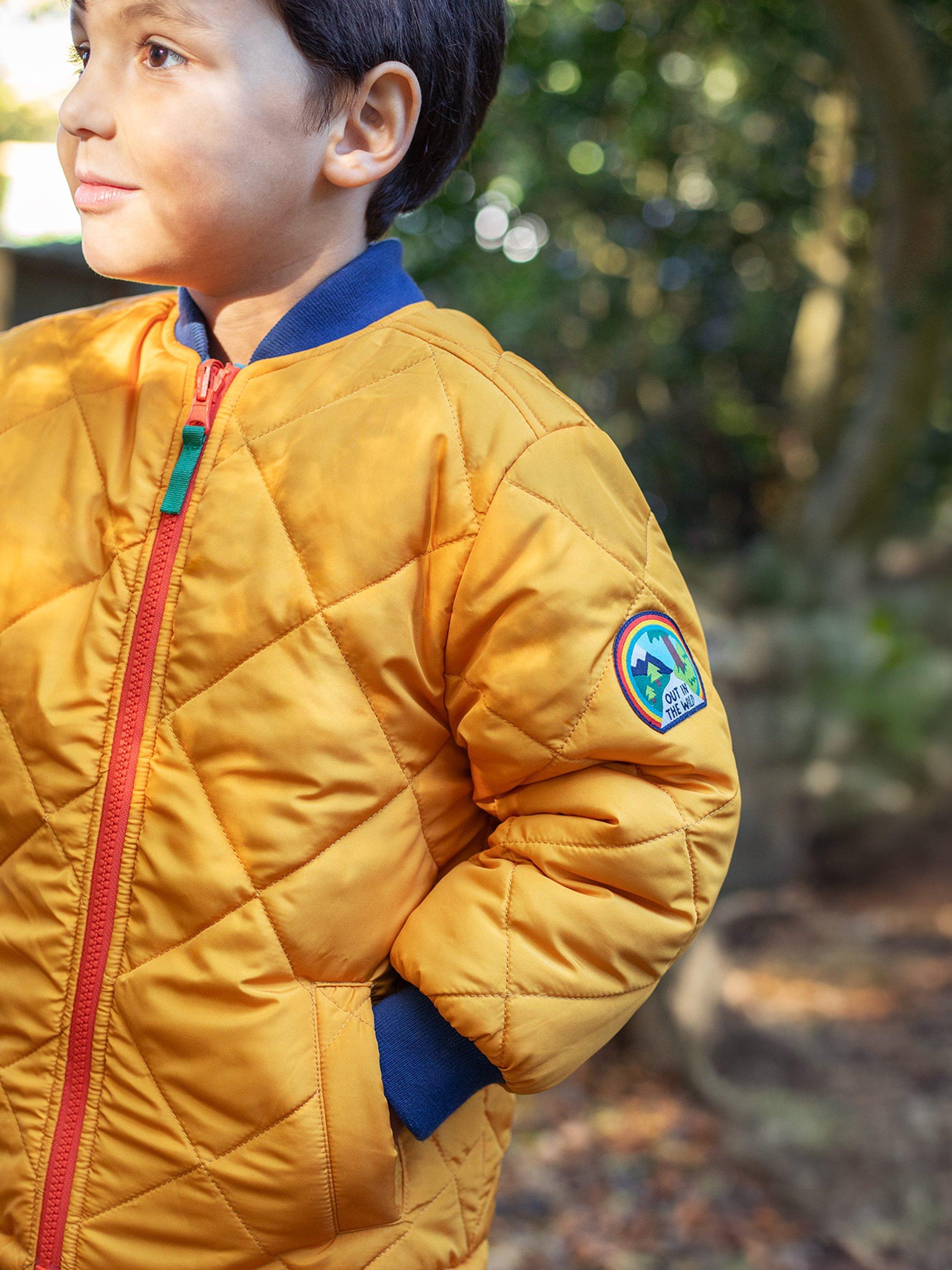 Product image 4 of 8, which shows Frugi Kids' Robin Quilted Reversible Jacket, Gold/Boat Blue, 2-3 years