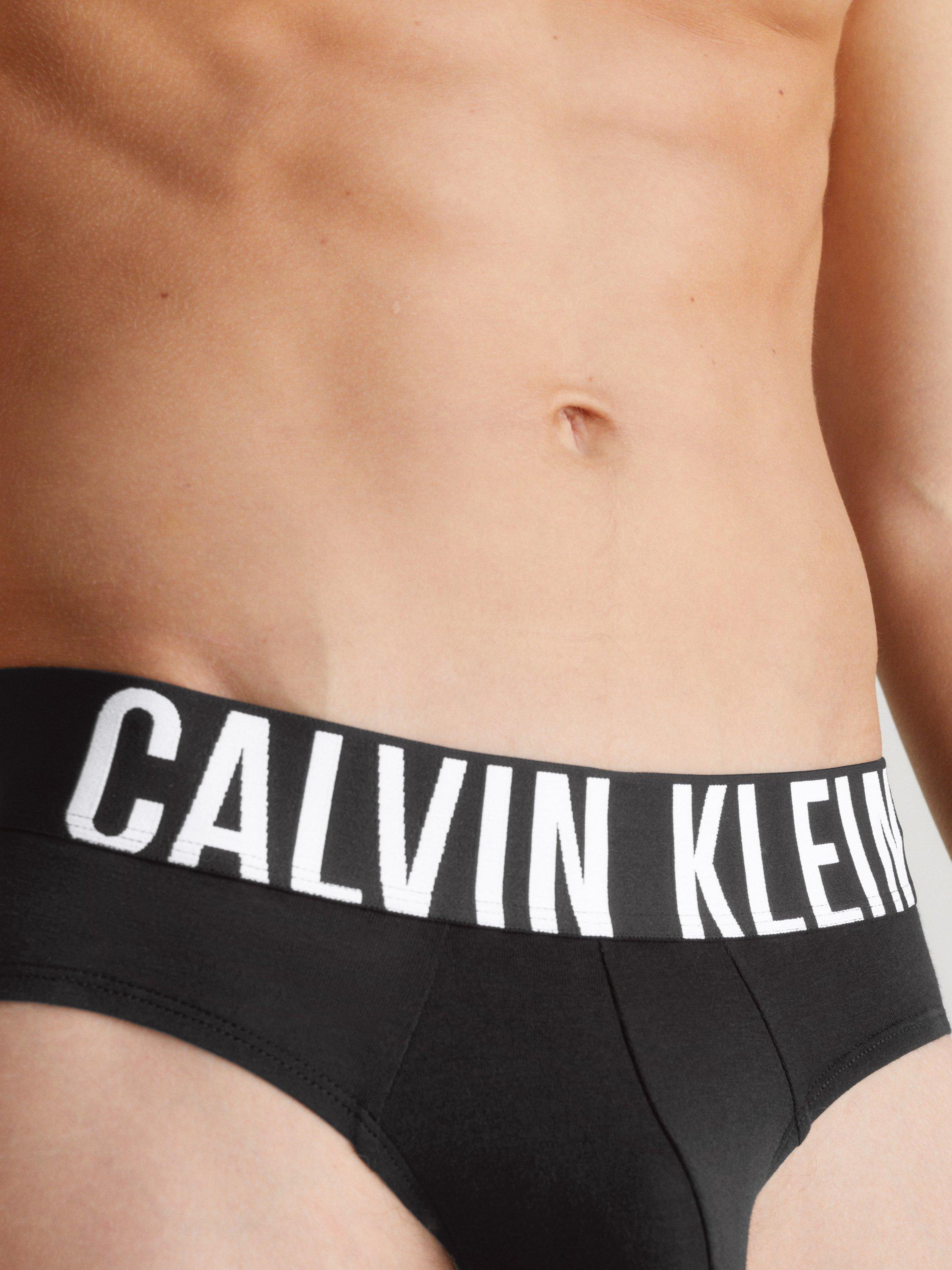 Product image 5 of 5, which shows Calvin Klein Stretch Cotton Hip Briefs, Pack of 3, Black, XS