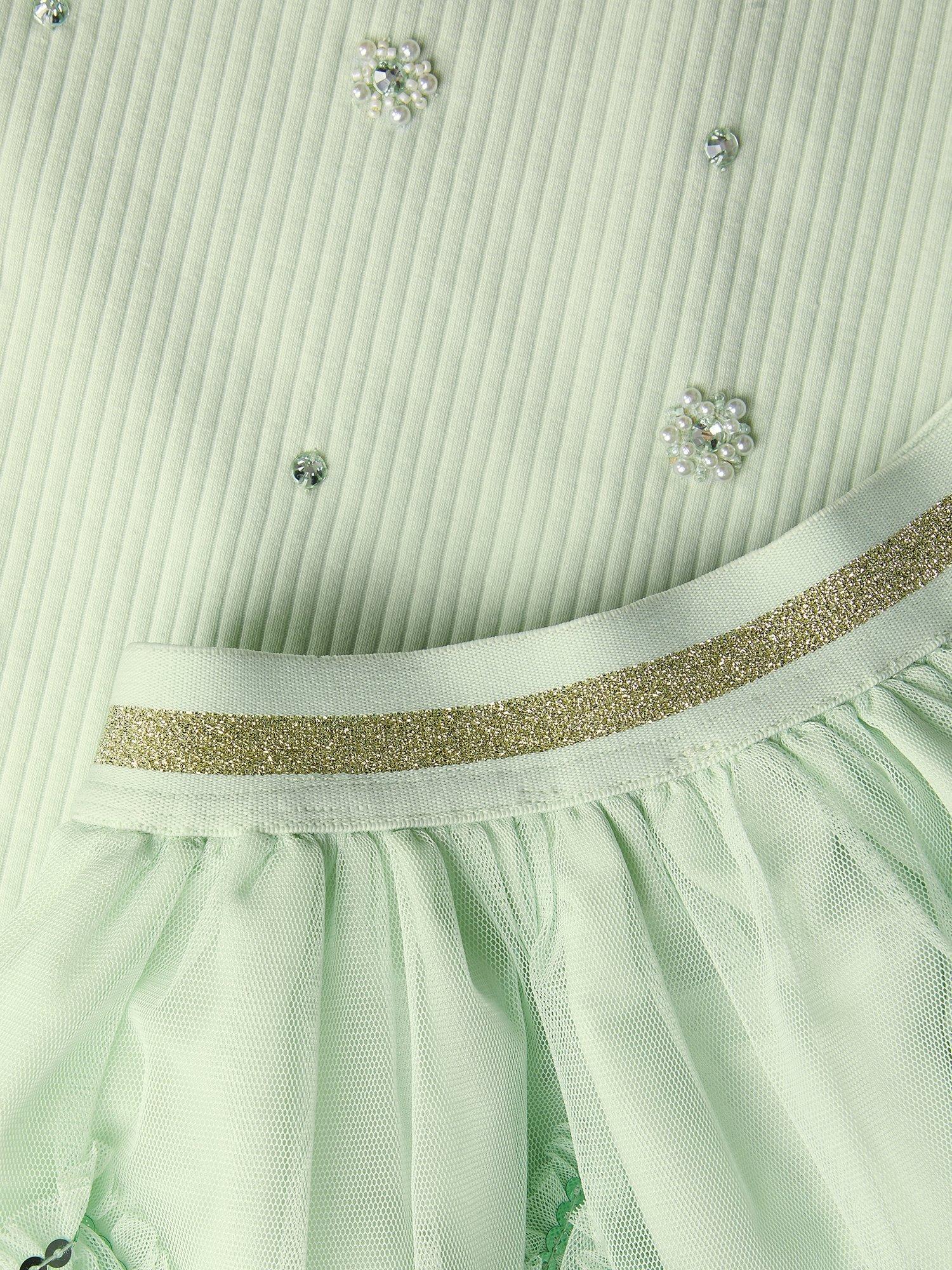 Product image 4 of 4, which shows Monsoon Kids' Ruffle Beaded T-Shirt & Skirt Set, Green, 3-4 years
