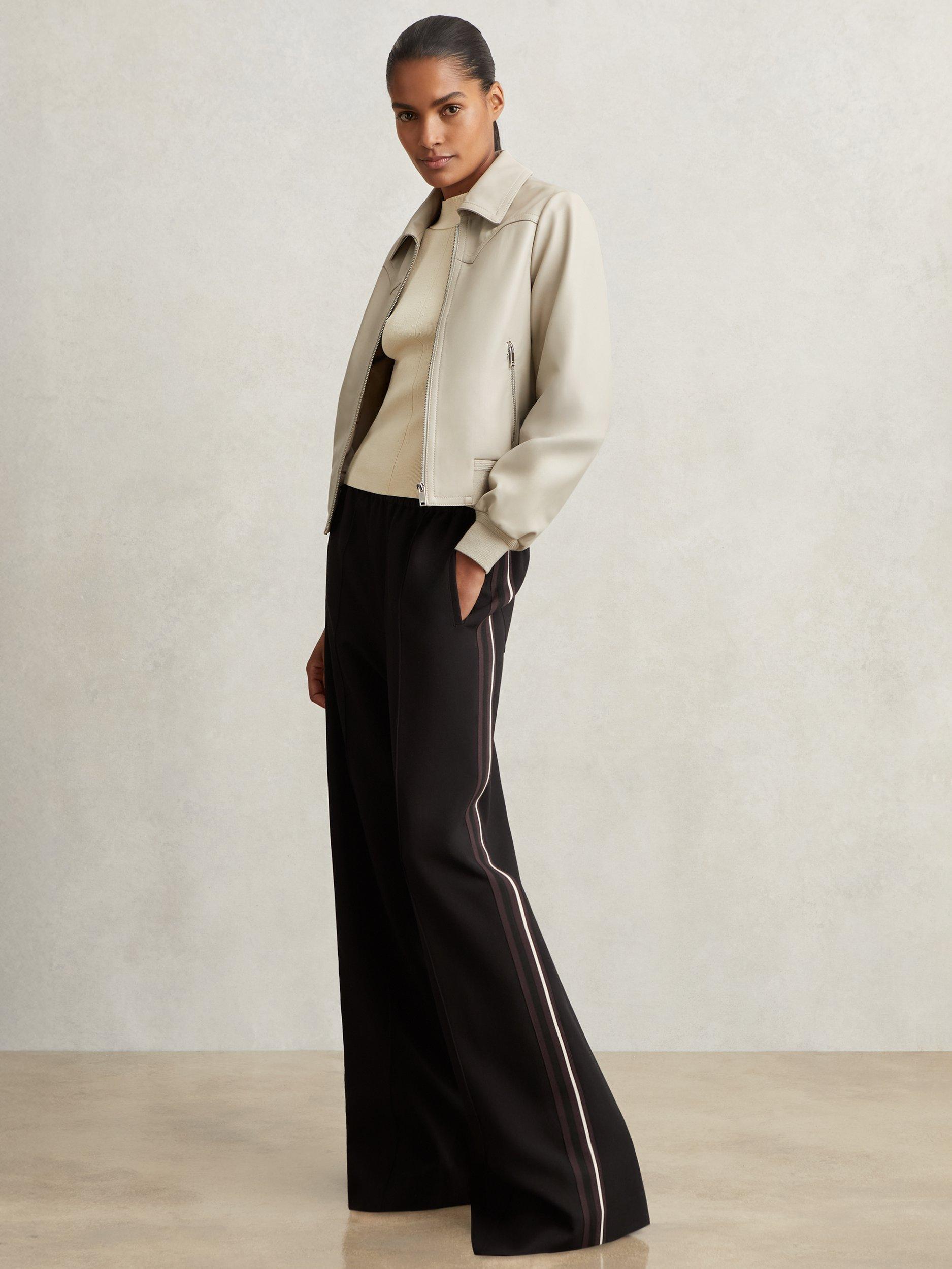Product image 1 of 5, which shows Reiss Petite Robyn Side Stripe Trousers, Black, 6Pt
