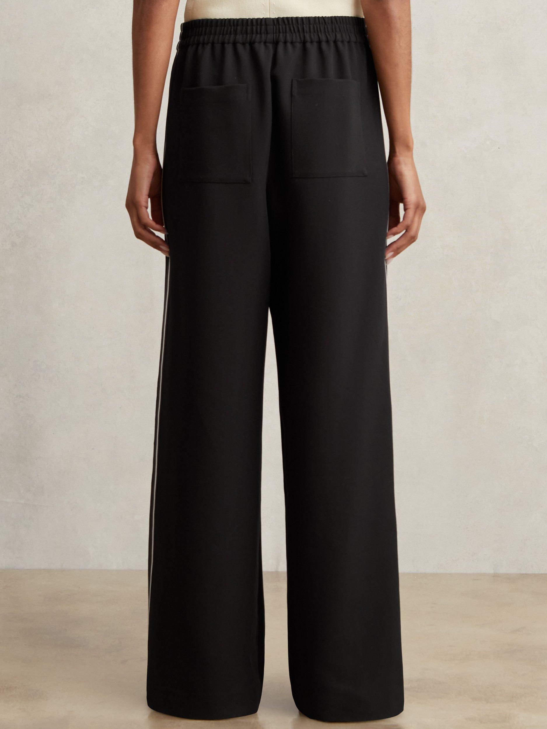 Product image 2 of 5, which shows Reiss Petite Robyn Side Stripe Trousers, Black, 6Pt