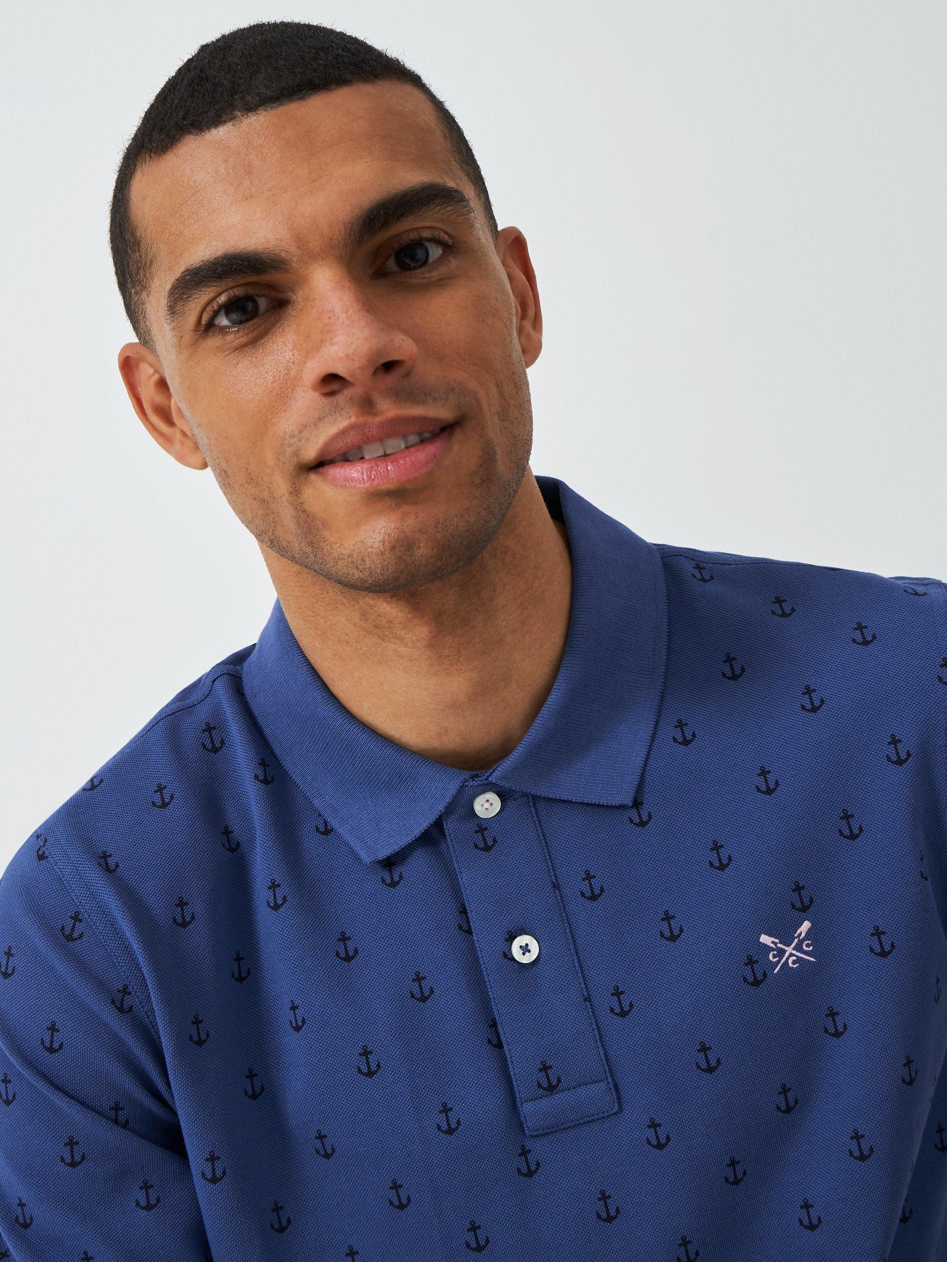 Product image 4 of 5, which shows Crew Clothing Cotton Regular Fit Short Sleeve Anchor Print Polo Shirt, Navy Blue, L