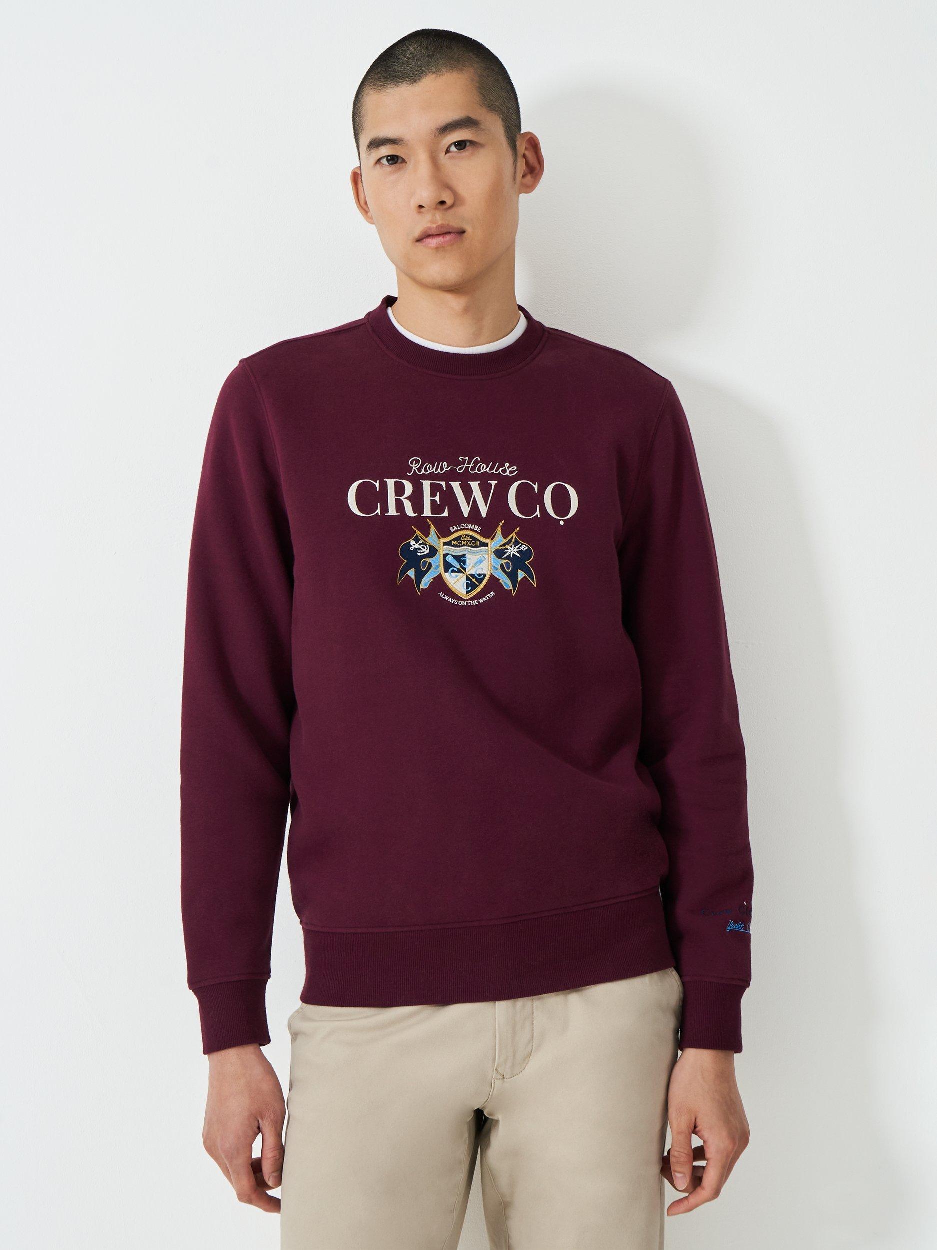 Product image 1 of 5, which shows Crew Clothing Embroidered Flag Sweatshirt, Burgundy Red, L