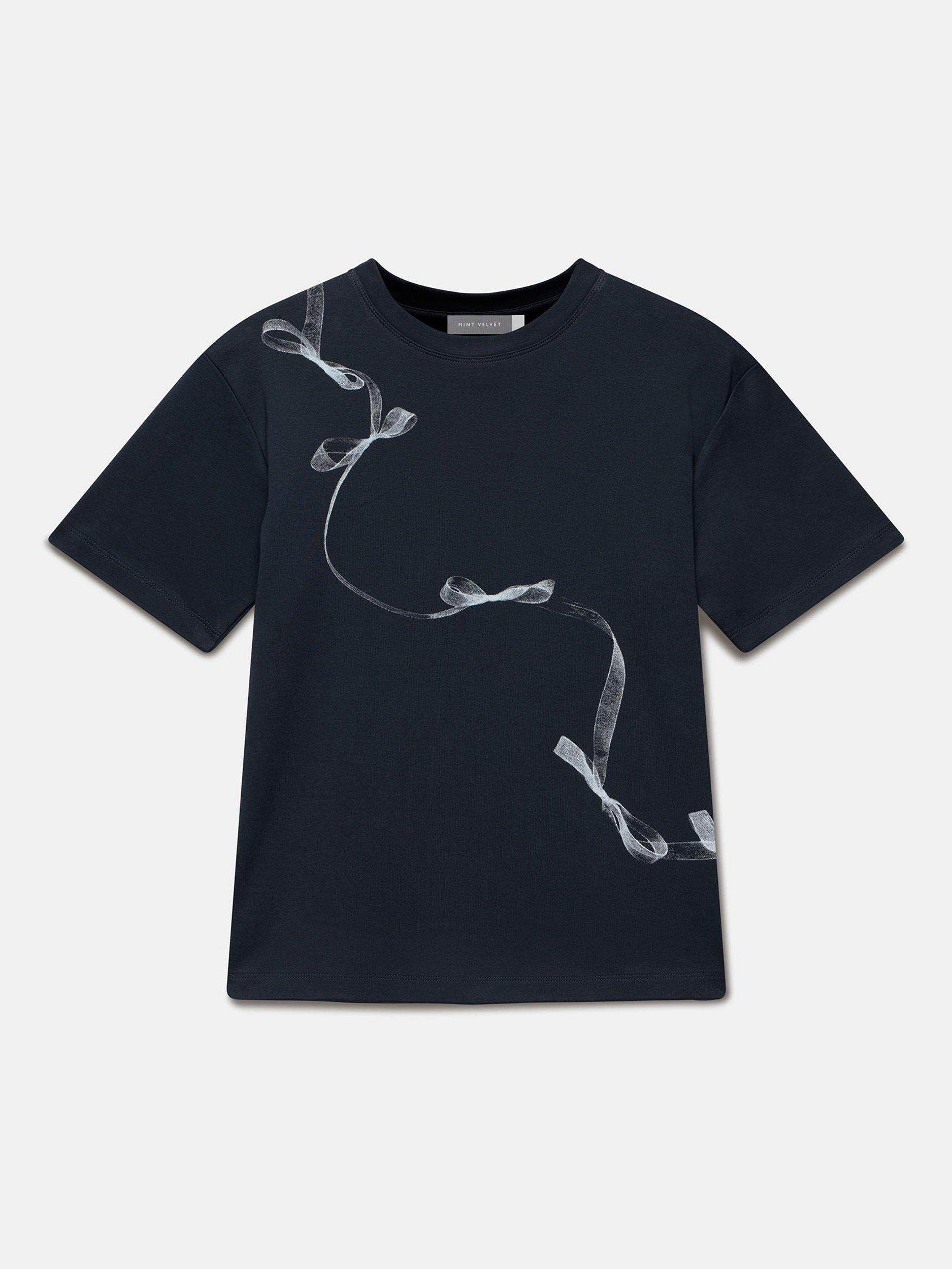 Product image 6 of 7, which shows Mint Velvet Graphic Ribbon Print Crew Neck Cotton T-Shirt, Navy, XS