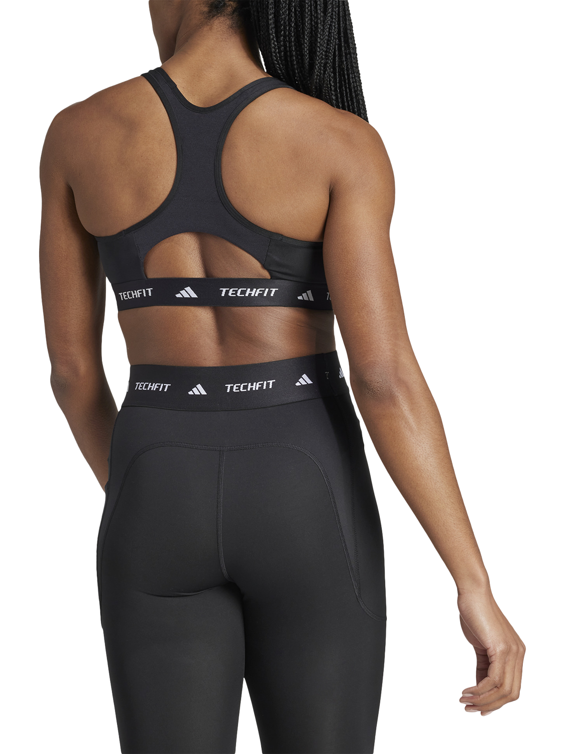 Product image 2 of 7, which shows adidas TECHFIT Sports Bra, Black, XS