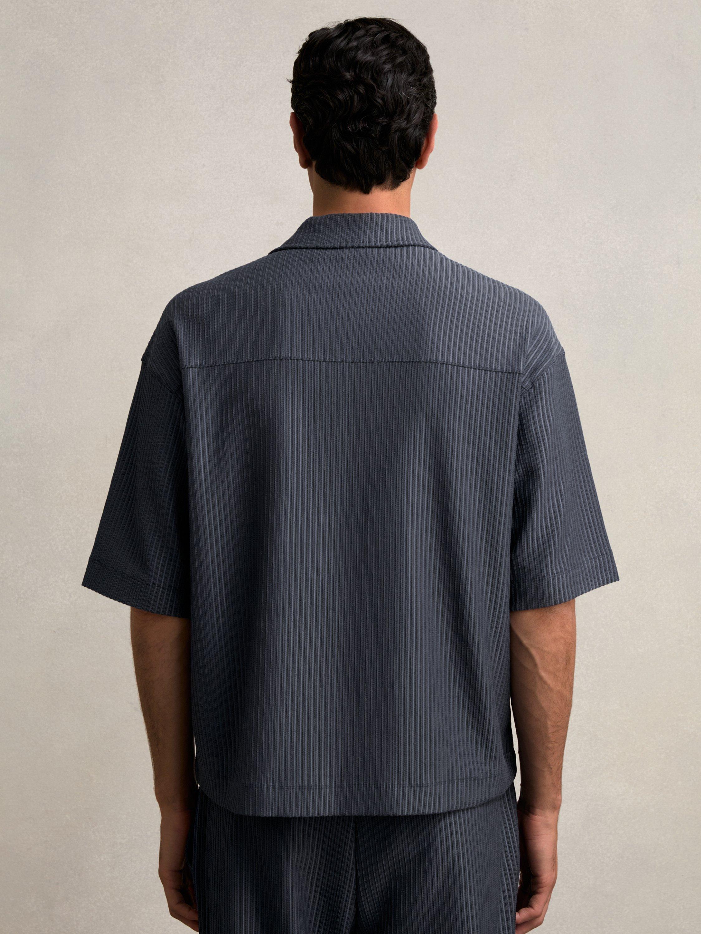 Product image 2 of 5, which shows Reiss Tobi Textured Zip Neck Polo Shirt, Petrol Blue, XS