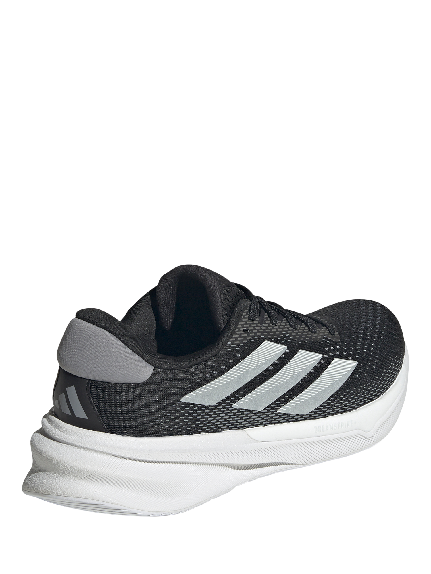 Product image 3 of 8, which shows adidas Women's Supernova Stride Running Shoes, Black/White, 4