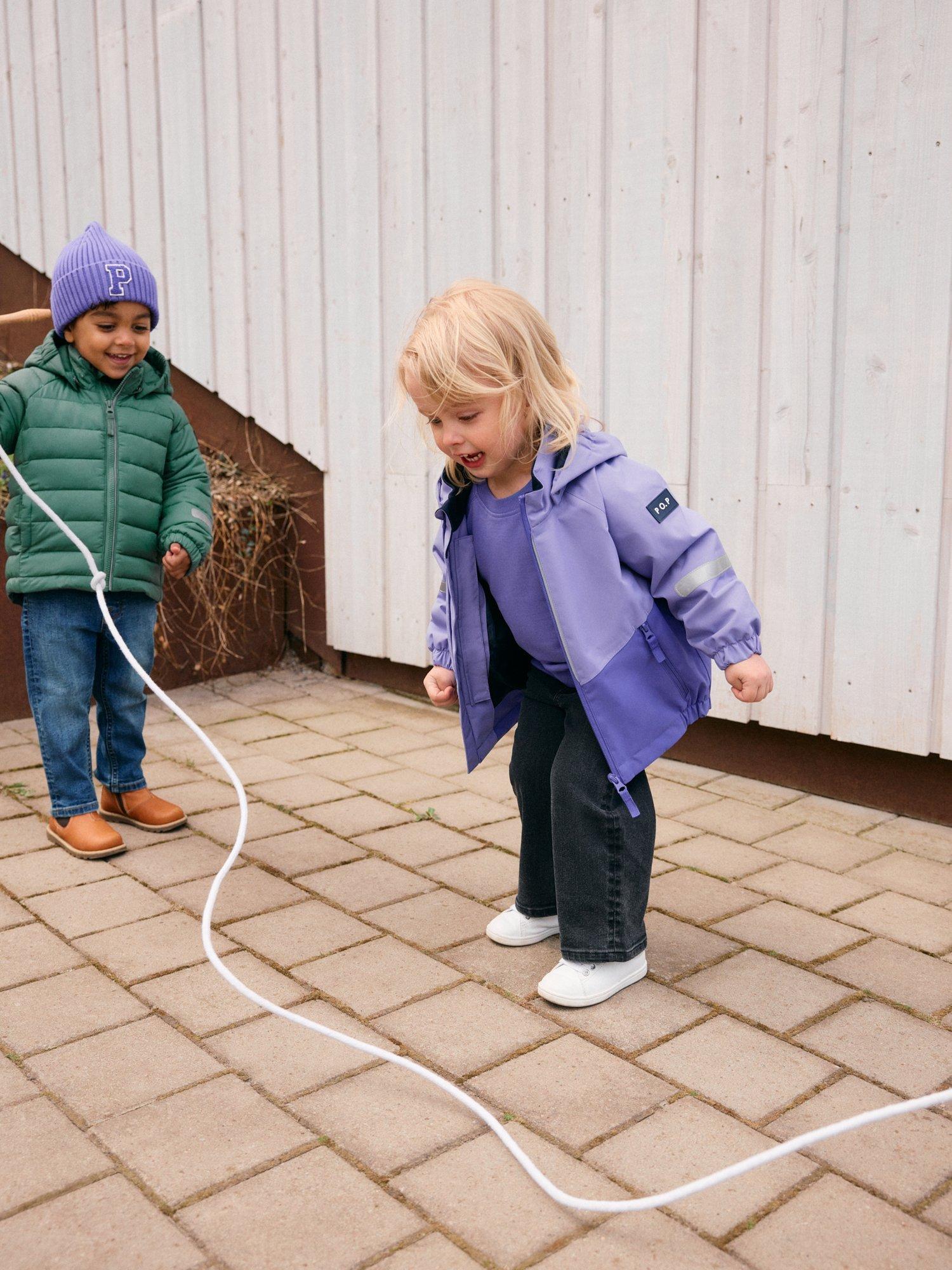 Product image 10 of 11, which shows Polarn O. Pyret Kids' Two-Tone Windproof Waterproof Shell Jacket, Purple, 3-4 years