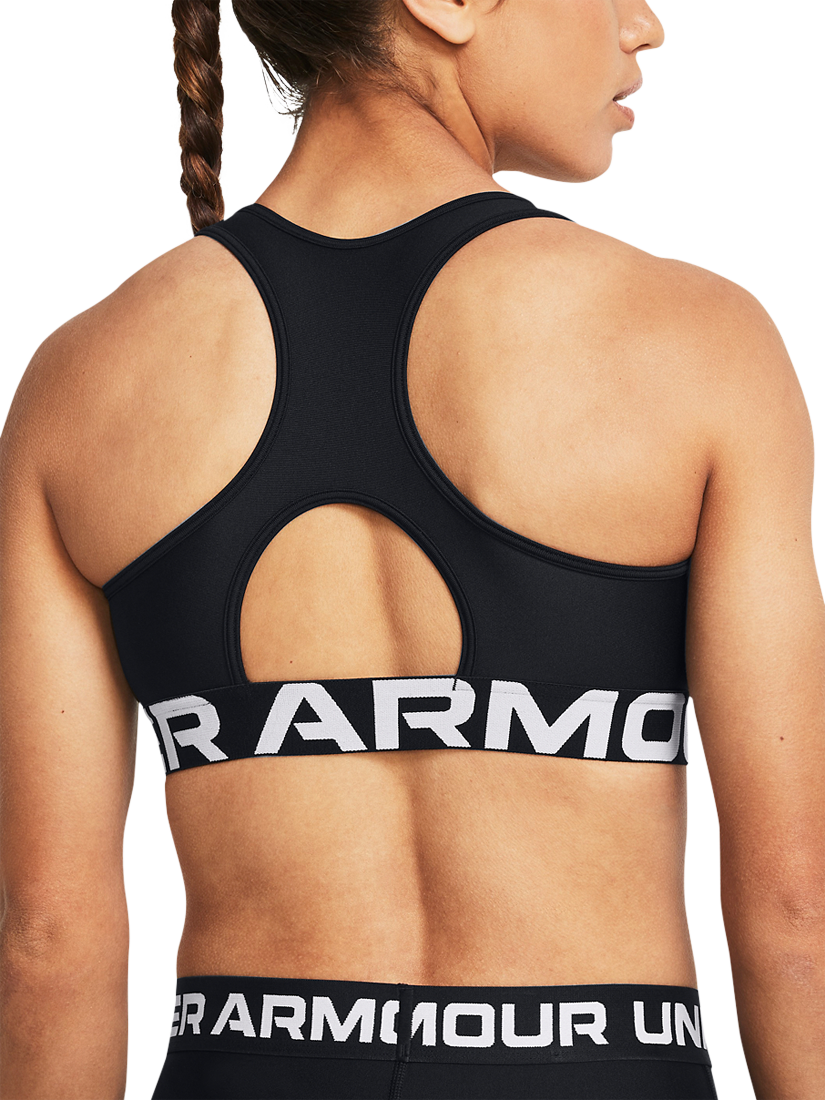 Product image 2 of 11, which shows Under Armour Logo Medium Impact Padded Sports Bra, Black / White, XS