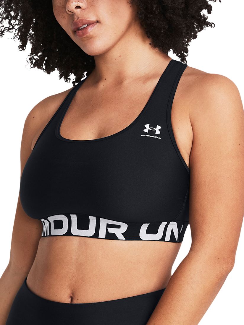 Product image 6 of 11, which shows Under Armour Logo Medium Impact Padded Sports Bra, Black / White, XS
