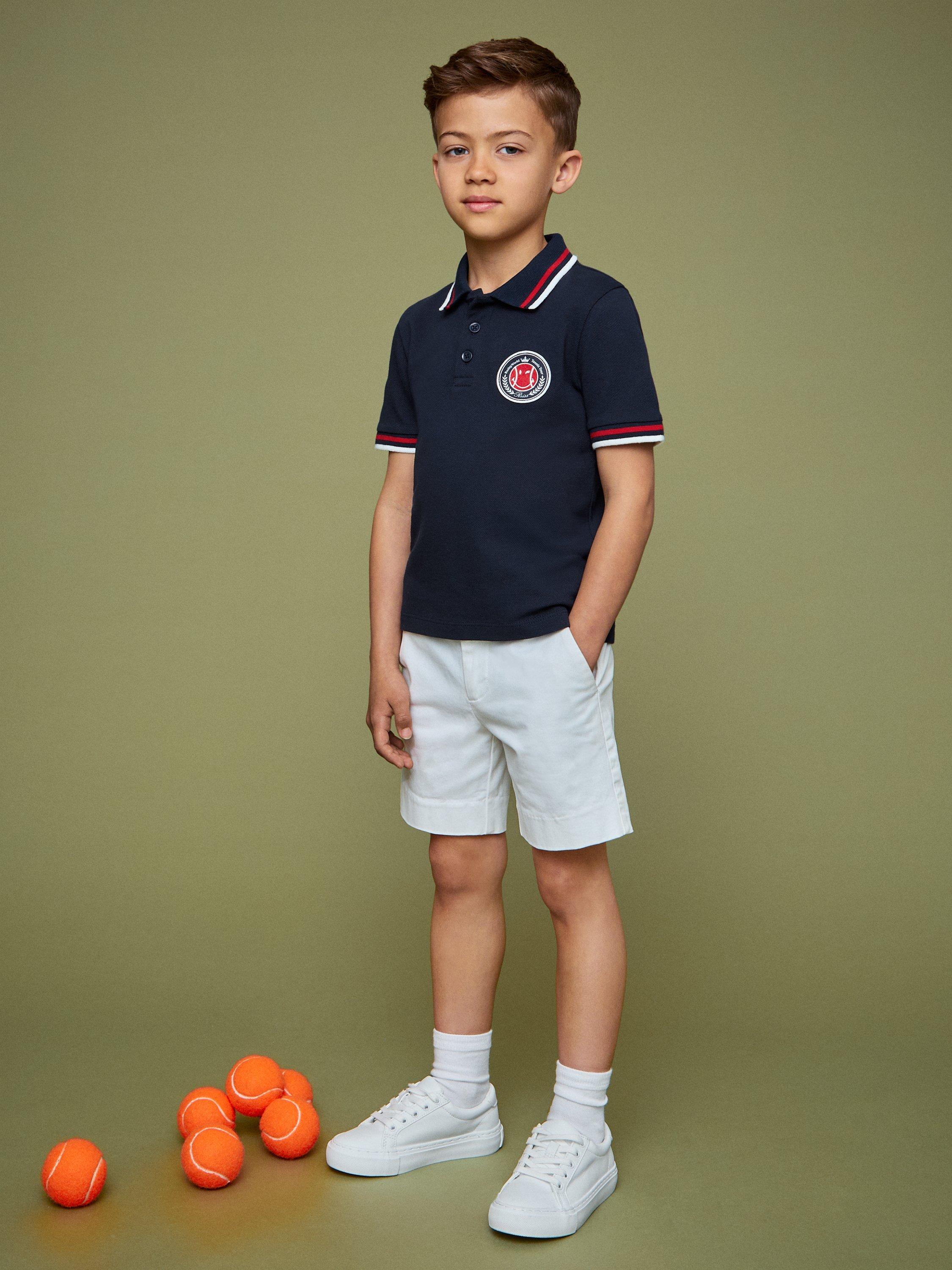 Product image 3 of 4, which shows Reiss Kids' Cotton Short Sleeved Polo Shirt, Navy, 3-4 years