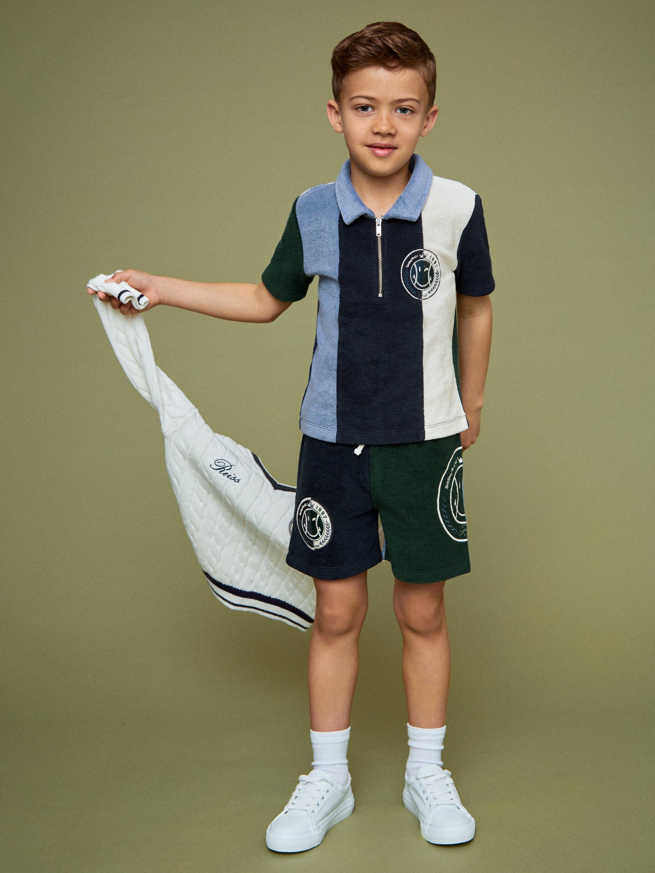 Product image 4 of 5, which shows Reiss Kids' Smiley Arthur Cotton Blend Zip Polo Shirt, Blue, 3-4 years