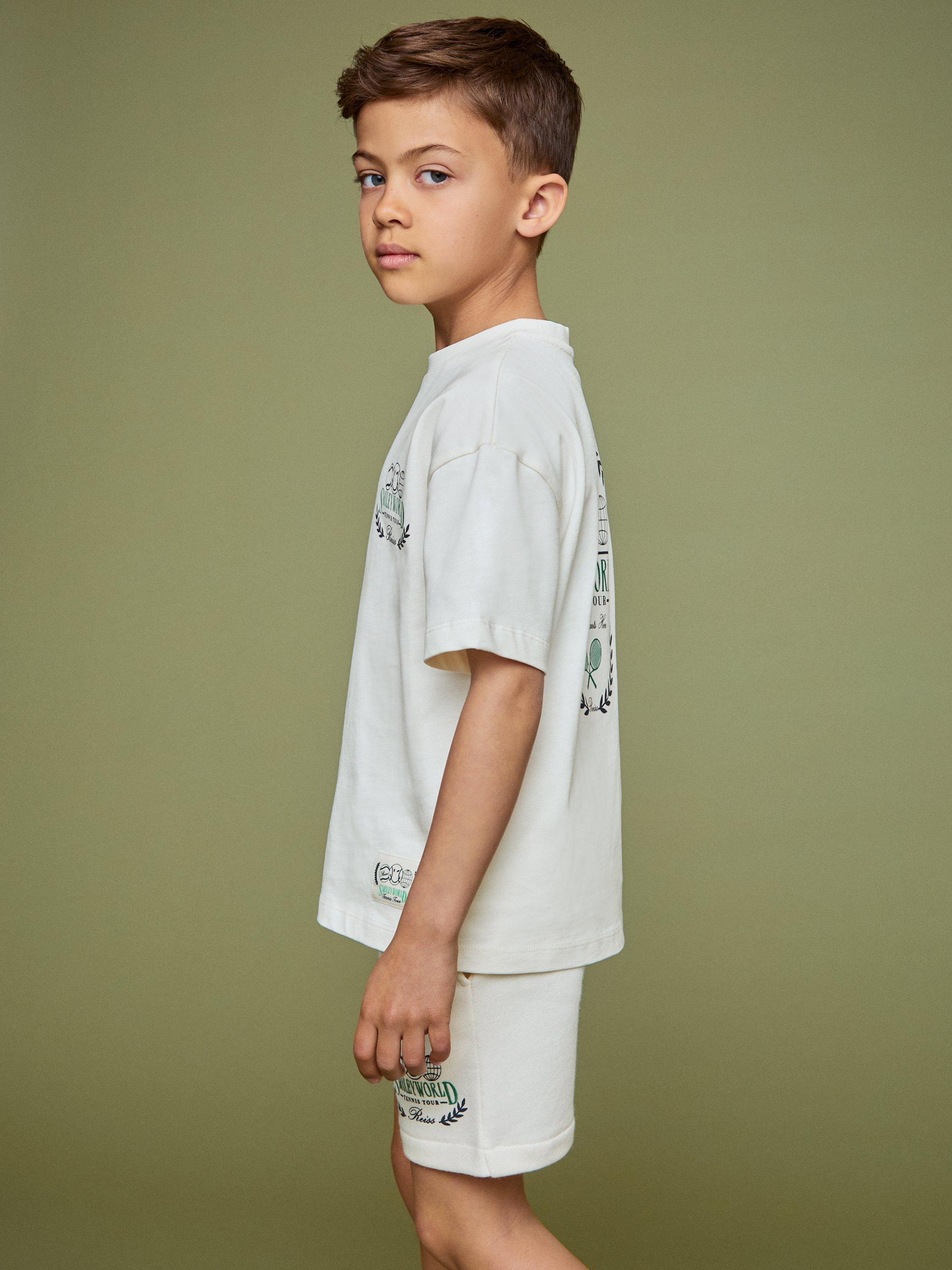 Product image 4 of 5, which shows Reiss Kids' Smiley Chip Cotton Short Sleeved T-Shirt, White, 3-4 years