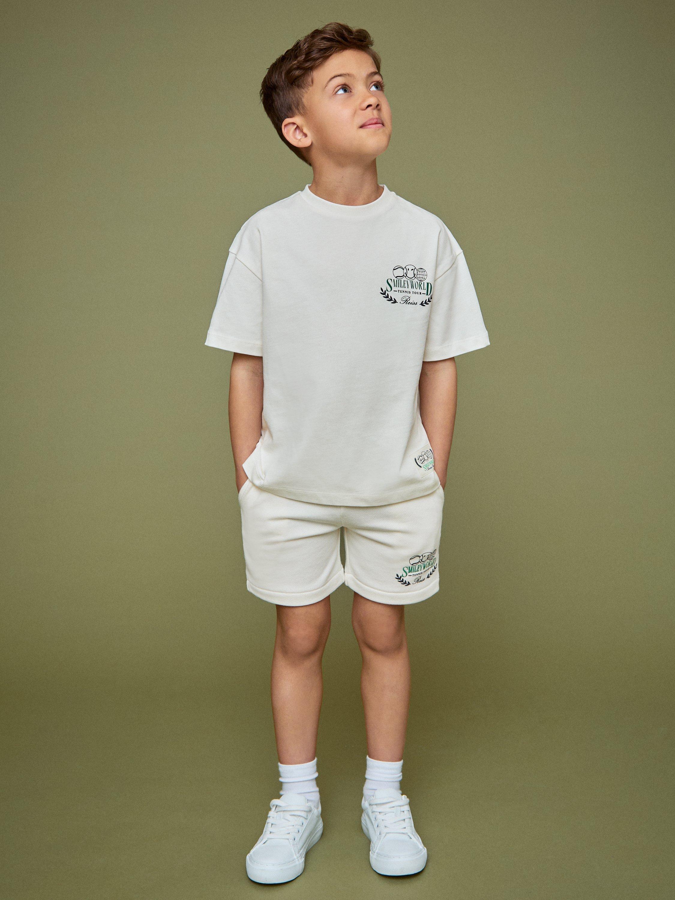 Product image 5 of 5, which shows Reiss Kids' Smiley Chip Cotton Short Sleeved T-Shirt, White, 3-4 years