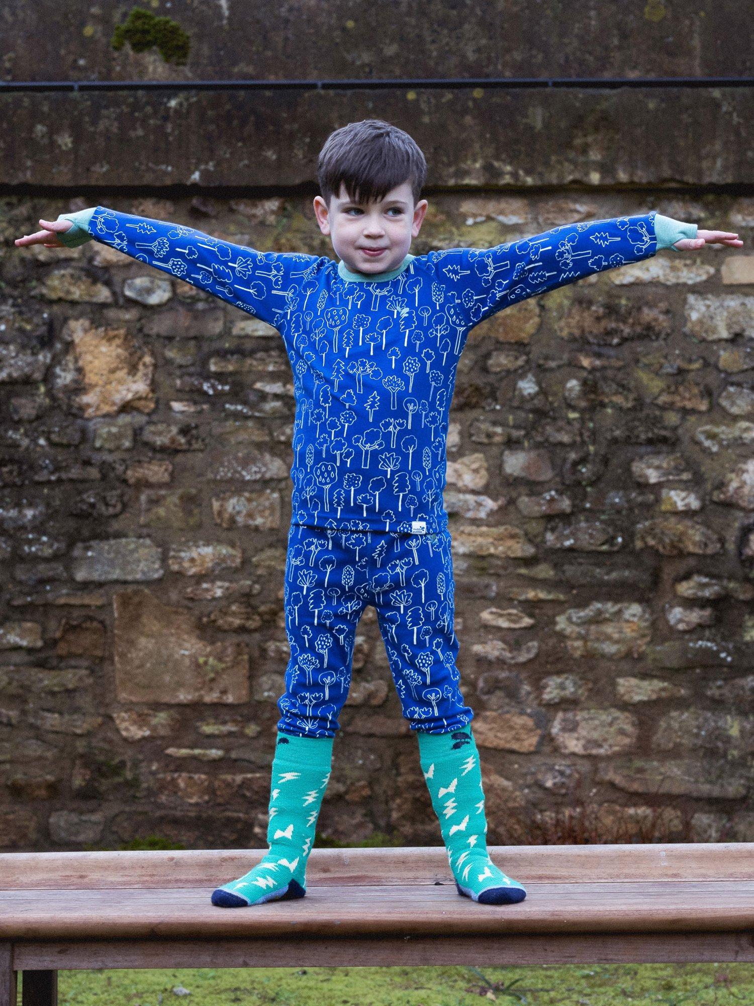 Product image 2 of 4, which shows Muddy Puddles Kids' Cotton Blend Base Layer Bottoms, Blue Forest, 6-12 months