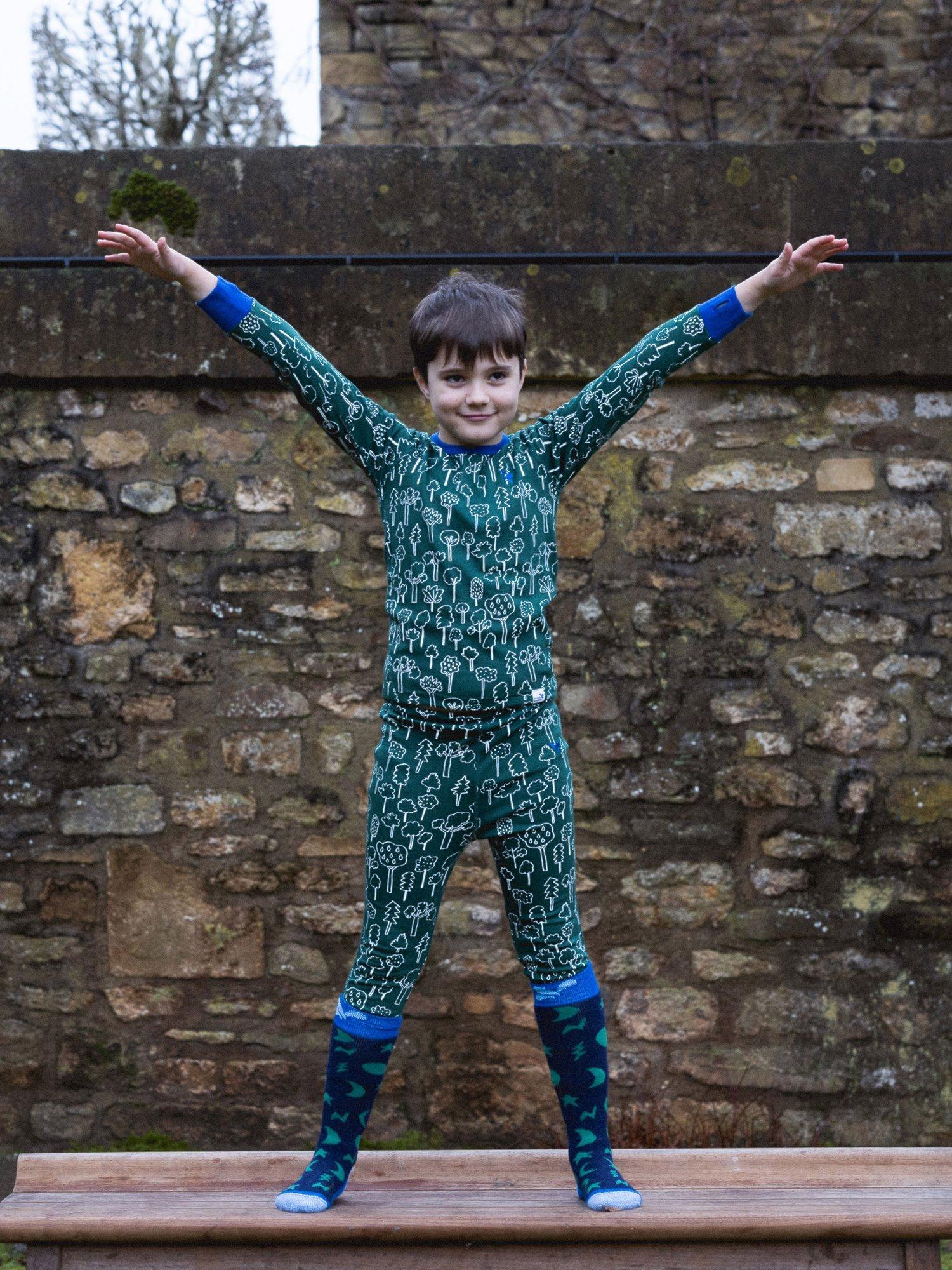 Product image 2 of 4, which shows Muddy Puddles Kids' Cotton Blend Base Layer Bottoms, Green Forest, 6-12 months