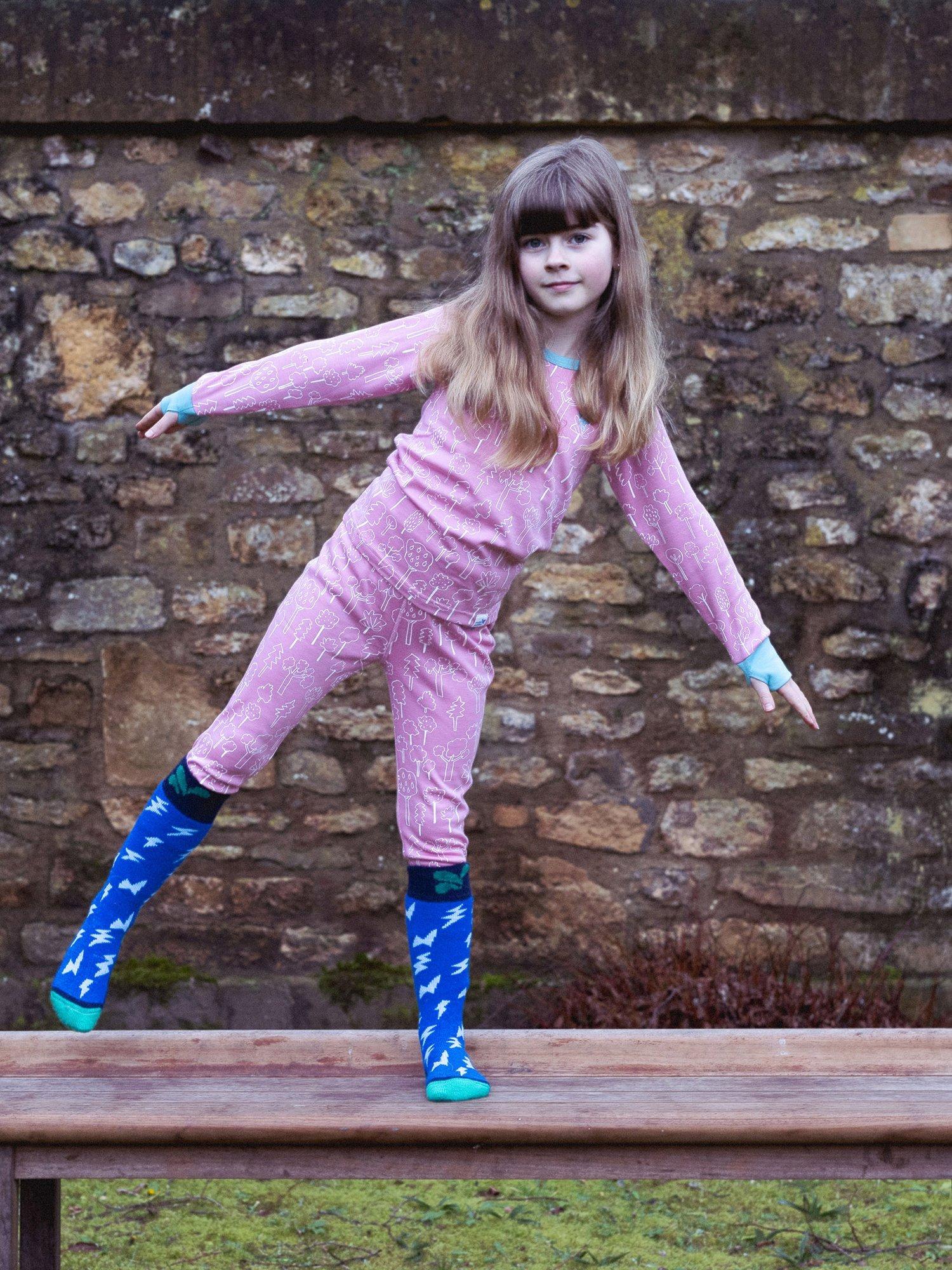 Product image 2 of 4, which shows Muddy Puddles Kids' Cotton Blend Base Layer Bottoms, Pink Forest, 6-12 months