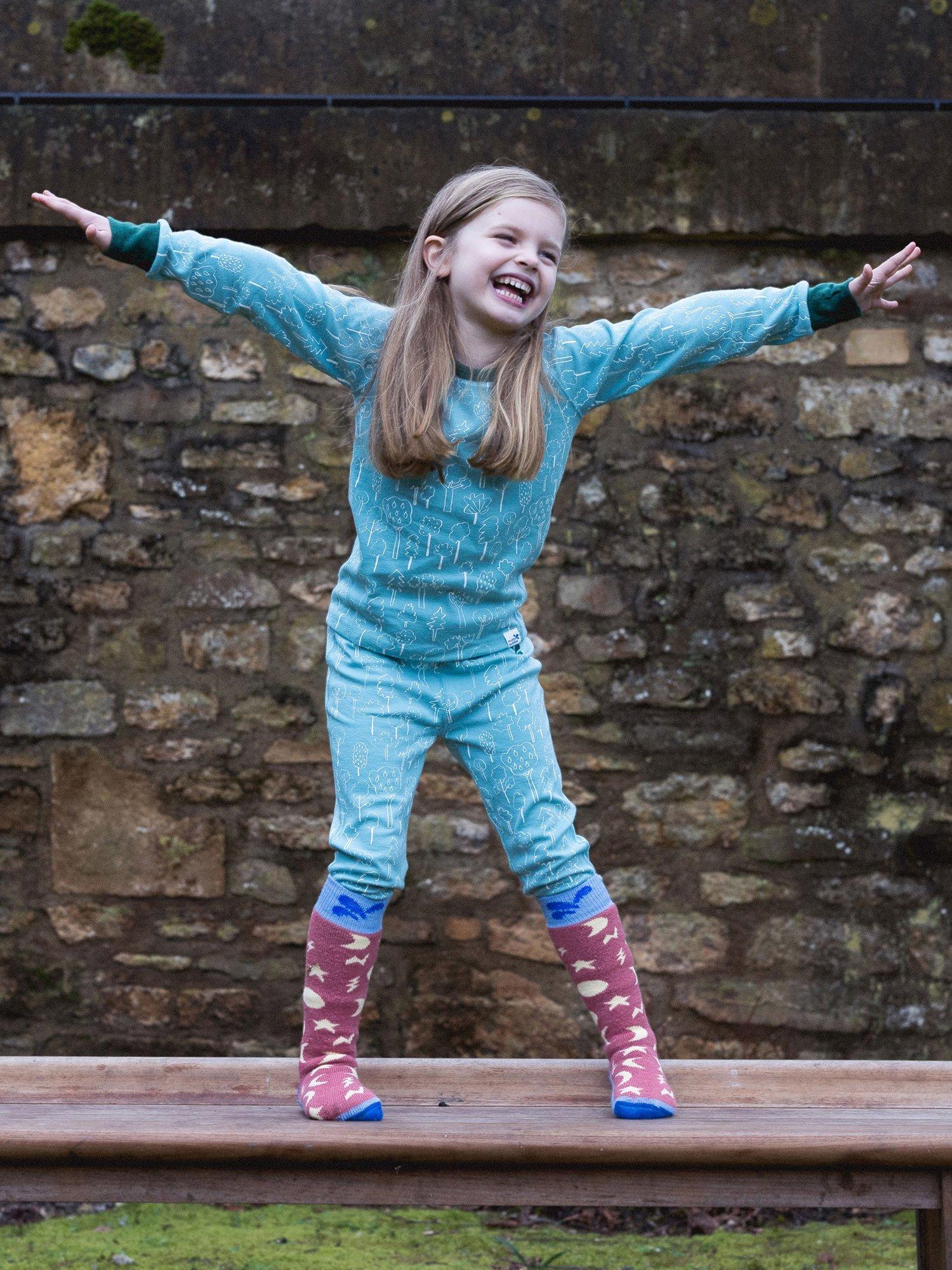 Product image 2 of 4, which shows Muddy Puddles Kids' Cotton Blend Base Layer Bottoms, Turquoise Forest, 6-12 months