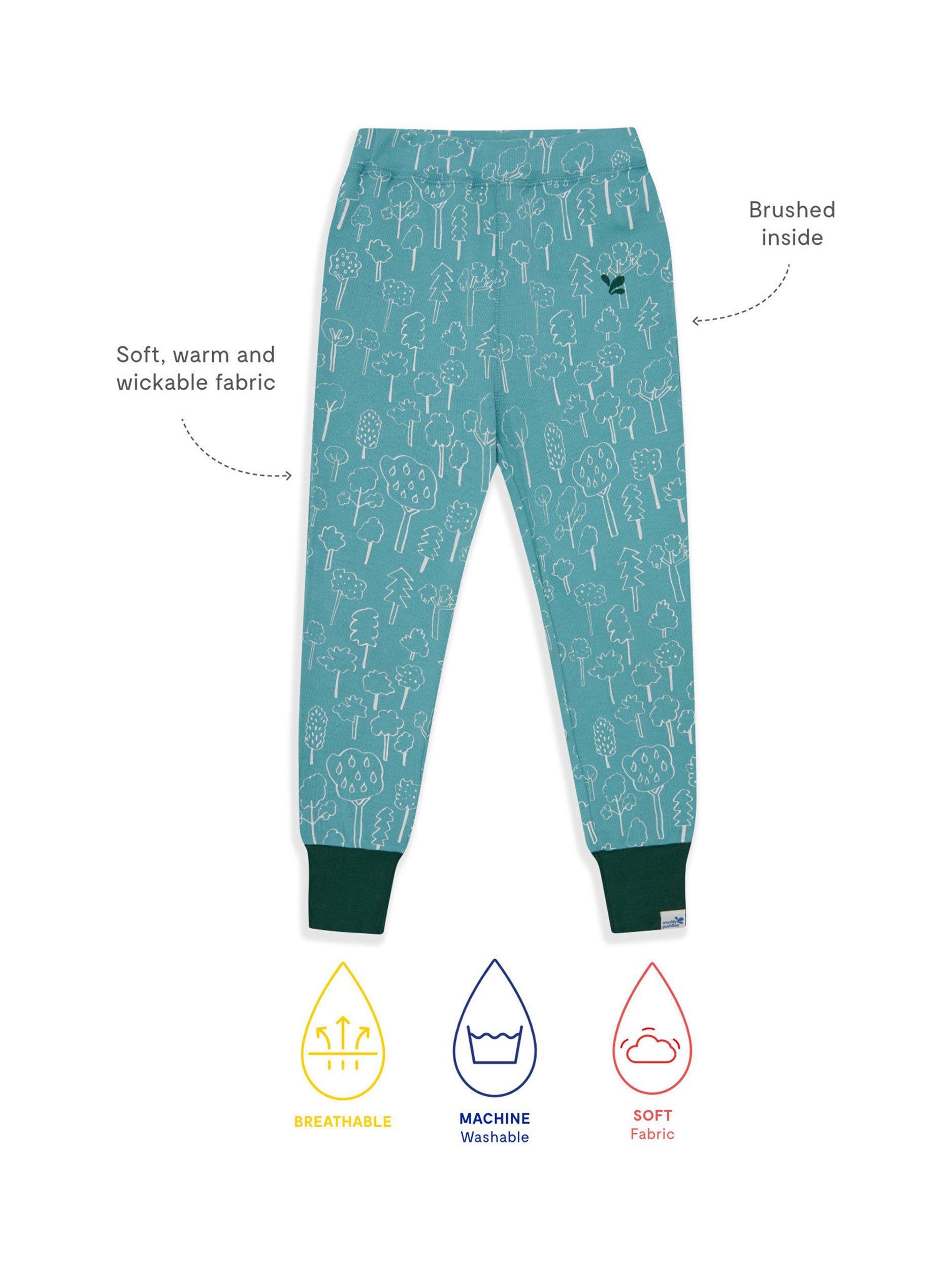 Product image 4 of 4, which shows Muddy Puddles Kids' Cotton Blend Base Layer Bottoms, Turquoise Forest, 6-12 months