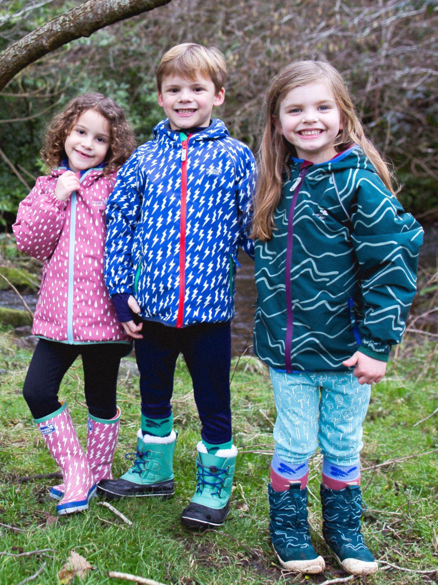 Product image 3 of 7, which shows Muddy Puddles Kids' Splash Hooded Rain Jacket, Blue Bolt, 18-24 months