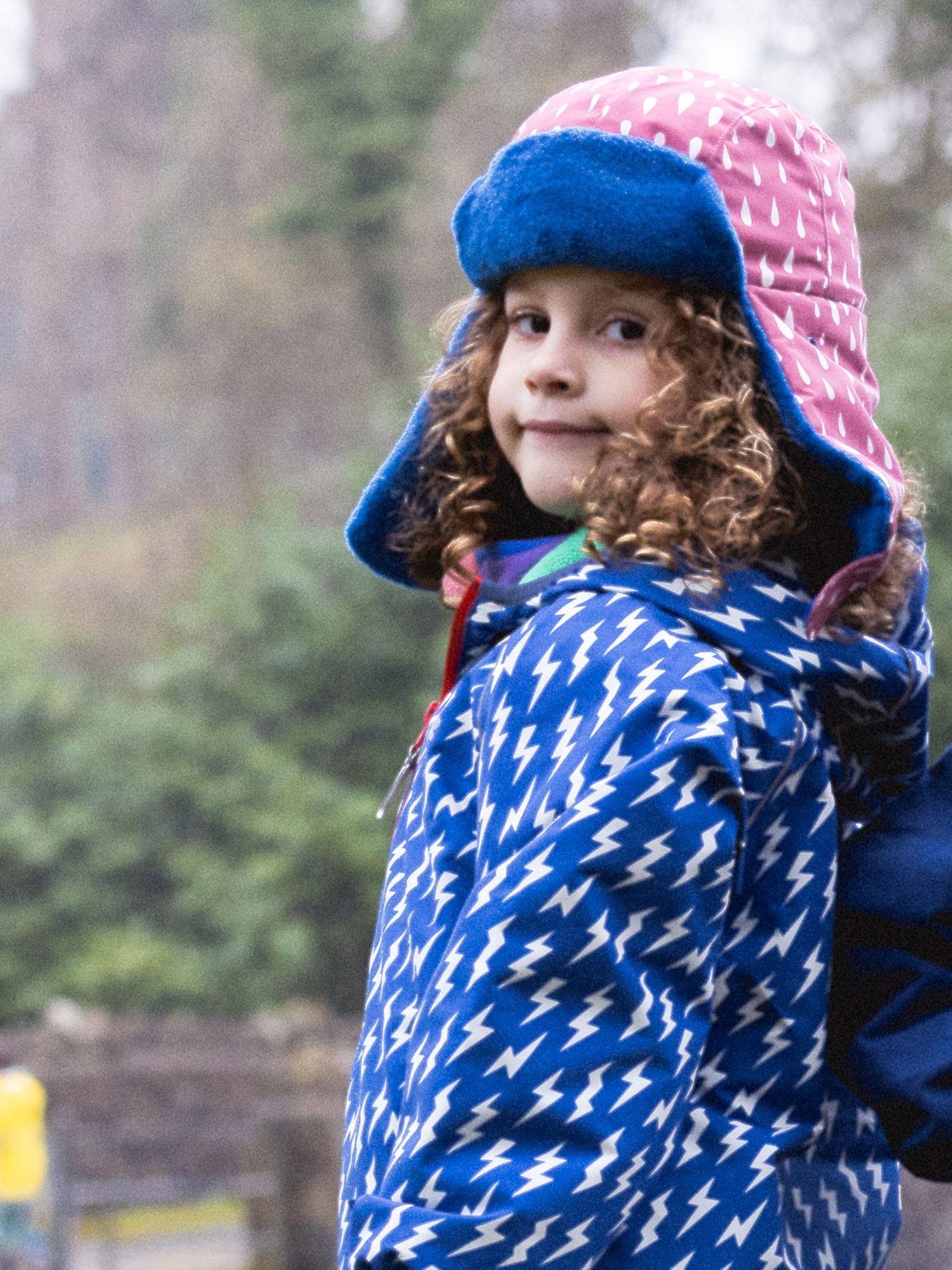 Product image 3 of 4, which shows Muddy Puddles Kids' Winter Trapper Hat, Pink/Multi, S/M