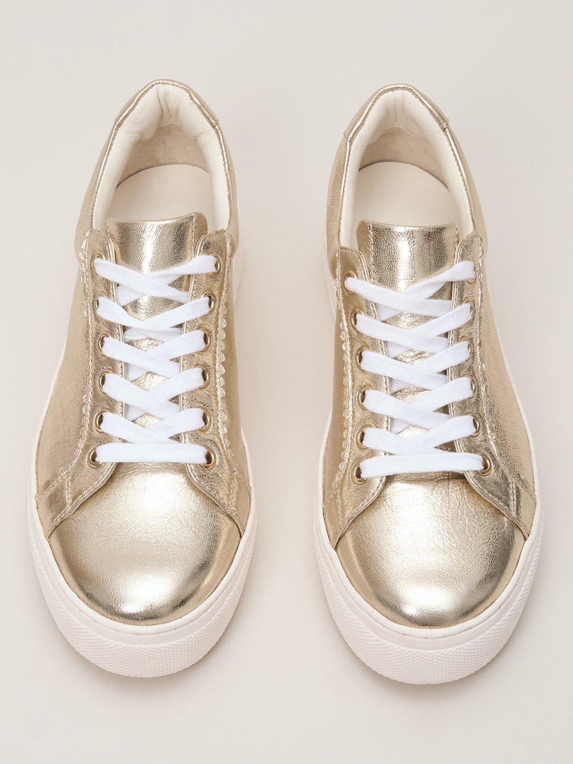 Product image 2 of 9, which shows Phase Eight Lace-Up Metallic Leather Trainers, Gold, 3