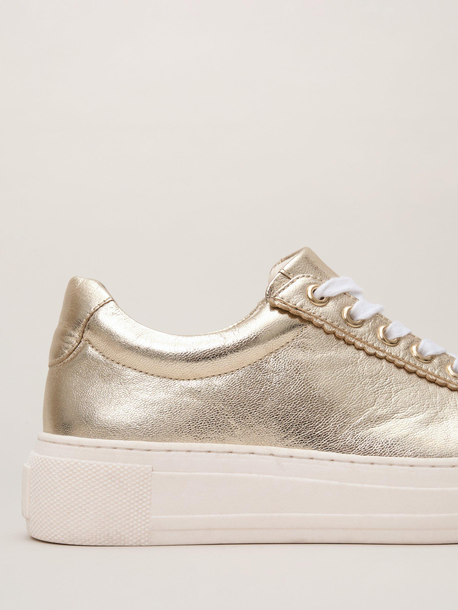 Product image 3 of 9, which shows Phase Eight Lace-Up Metallic Leather Trainers, Gold, 3