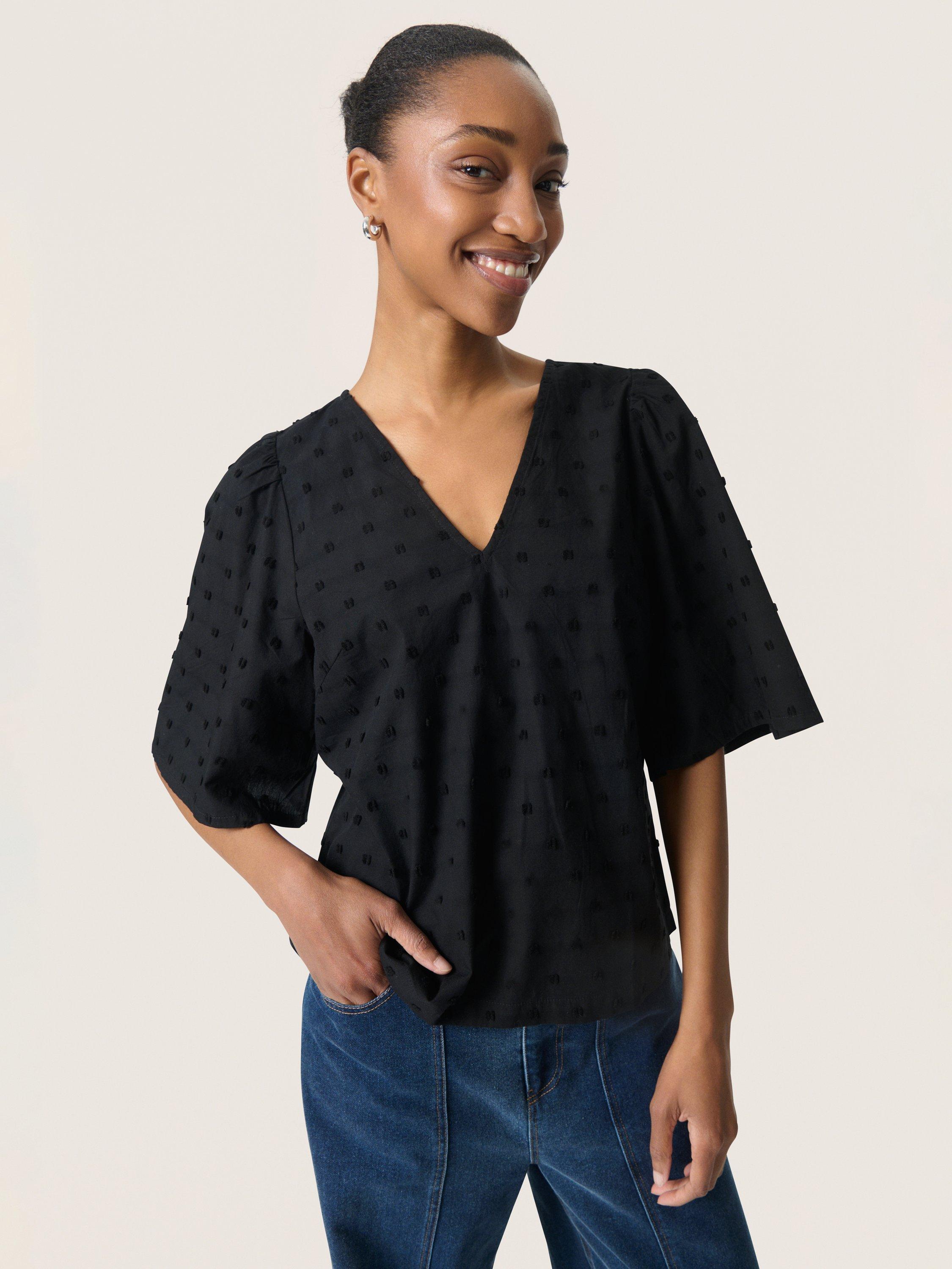 Product image 1 of 6, which shows Soaked In Luxury Sunela Short Sleeve V-Neck Cotton Blouse, Black, XS
