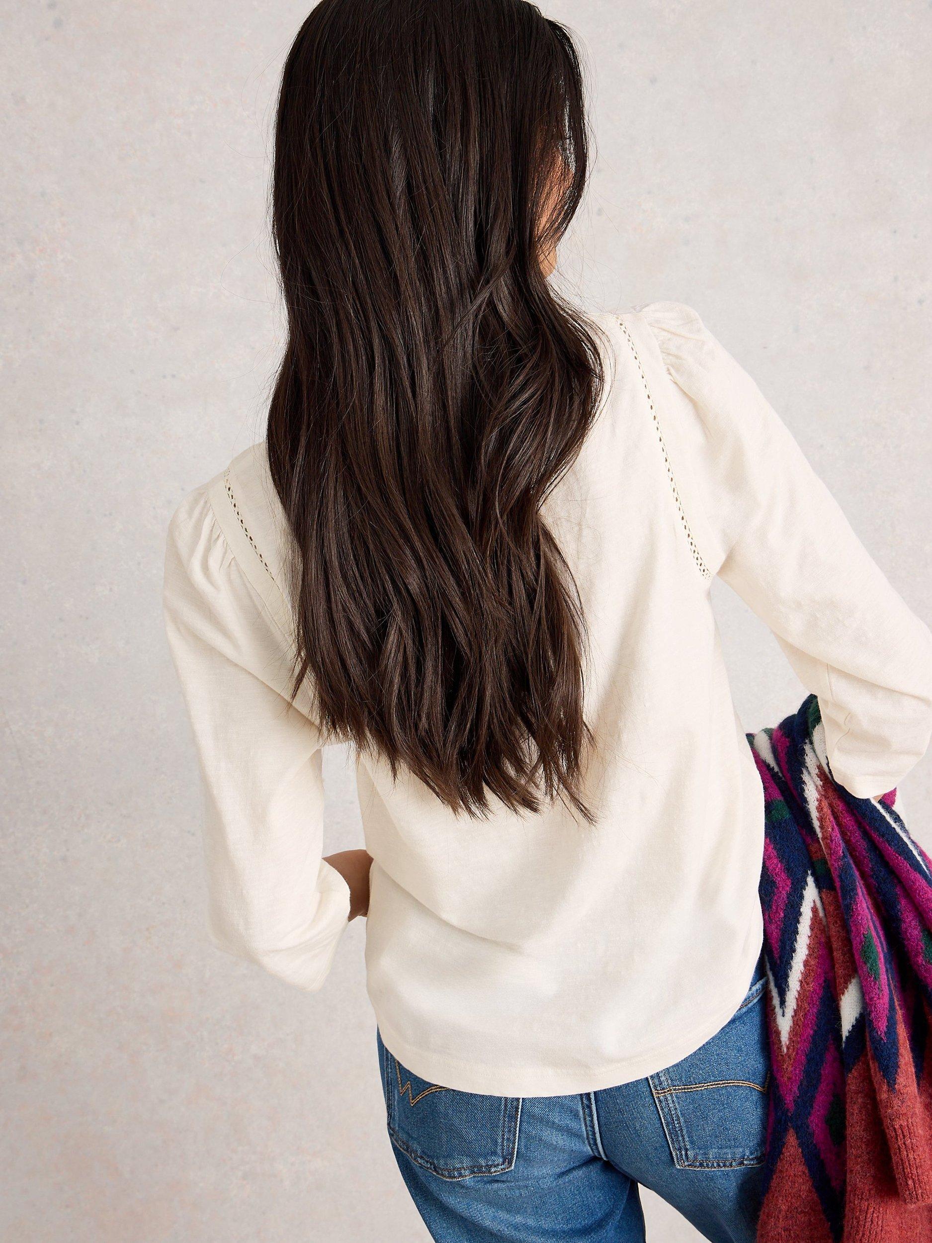 Product image 2 of 6, which shows White Stuff Lucy Ladder Trim Jersey Top, Pale Ivory, 10