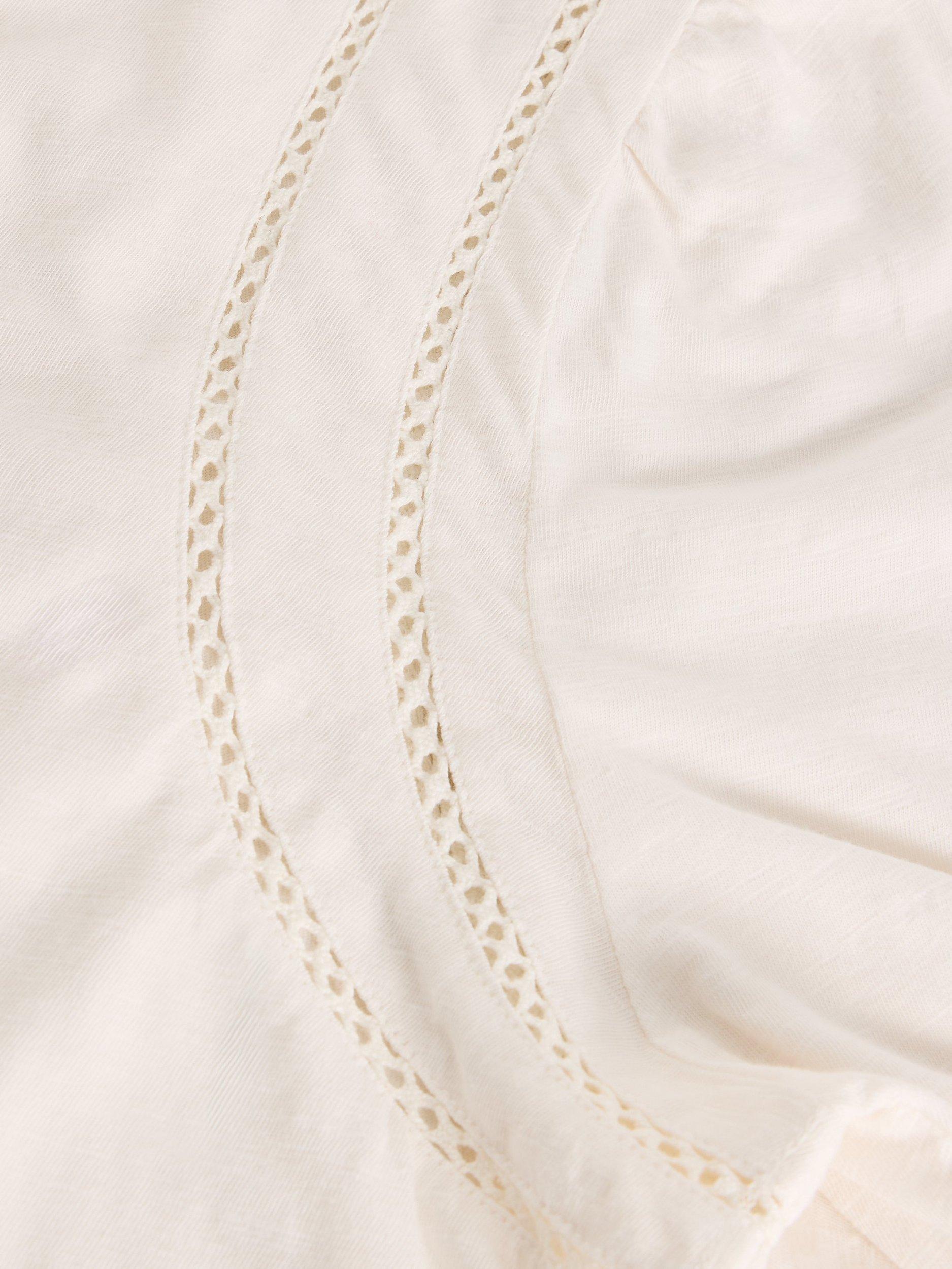 Product image 6 of 6, which shows White Stuff Lucy Ladder Trim Jersey Top, Pale Ivory, 10