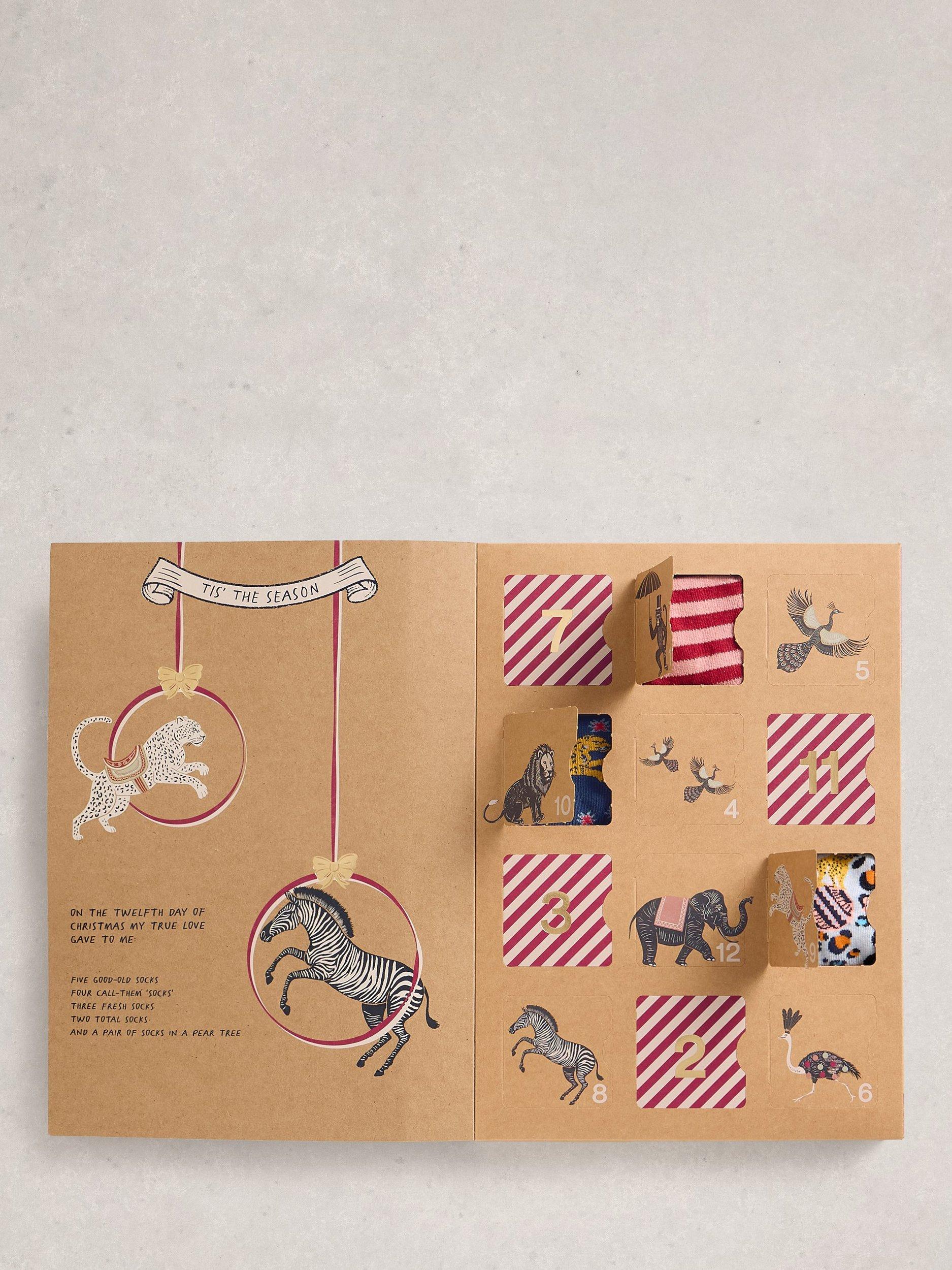 Product image 1 of 6, which shows White Stuff Advent Socks, Pack of 12, Pink/Multi, One Size