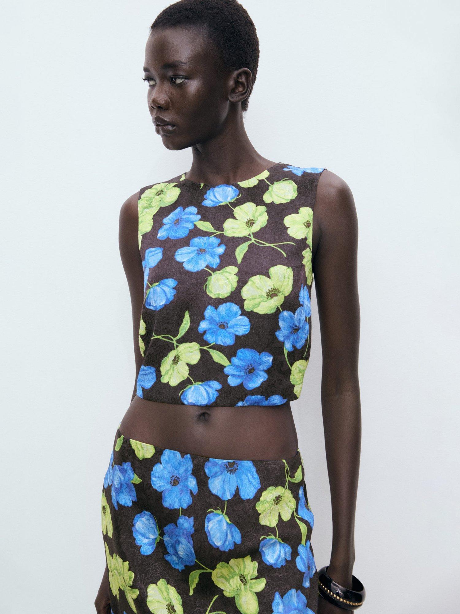 Product image 1 of 8, which shows Mango Mati Floral Open Back Top, Black, 10