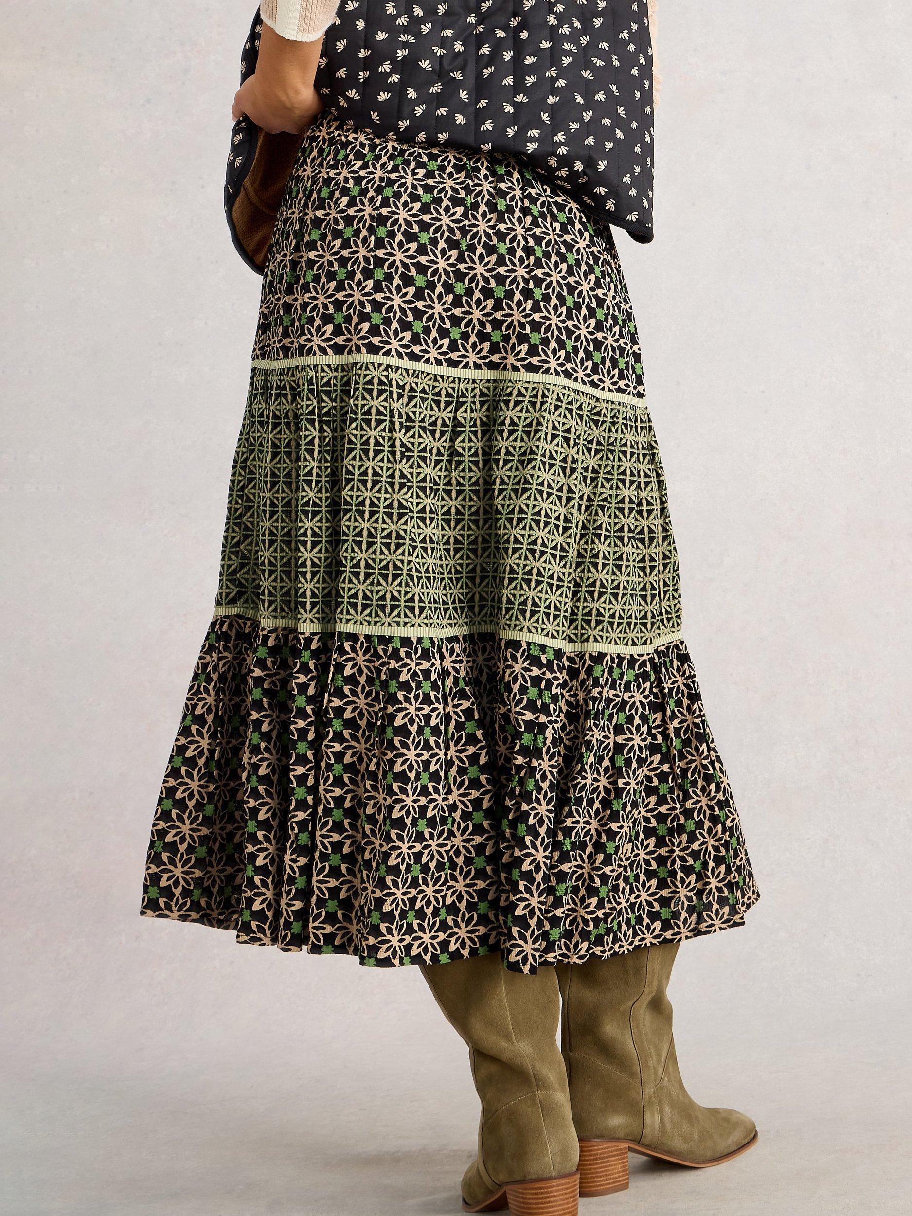 Product image 2 of 6, which shows White Stuff Mabel Tiered Midi Skirt containing LENZING™ ECOVERO™ Viscose, Black/Multi, 6