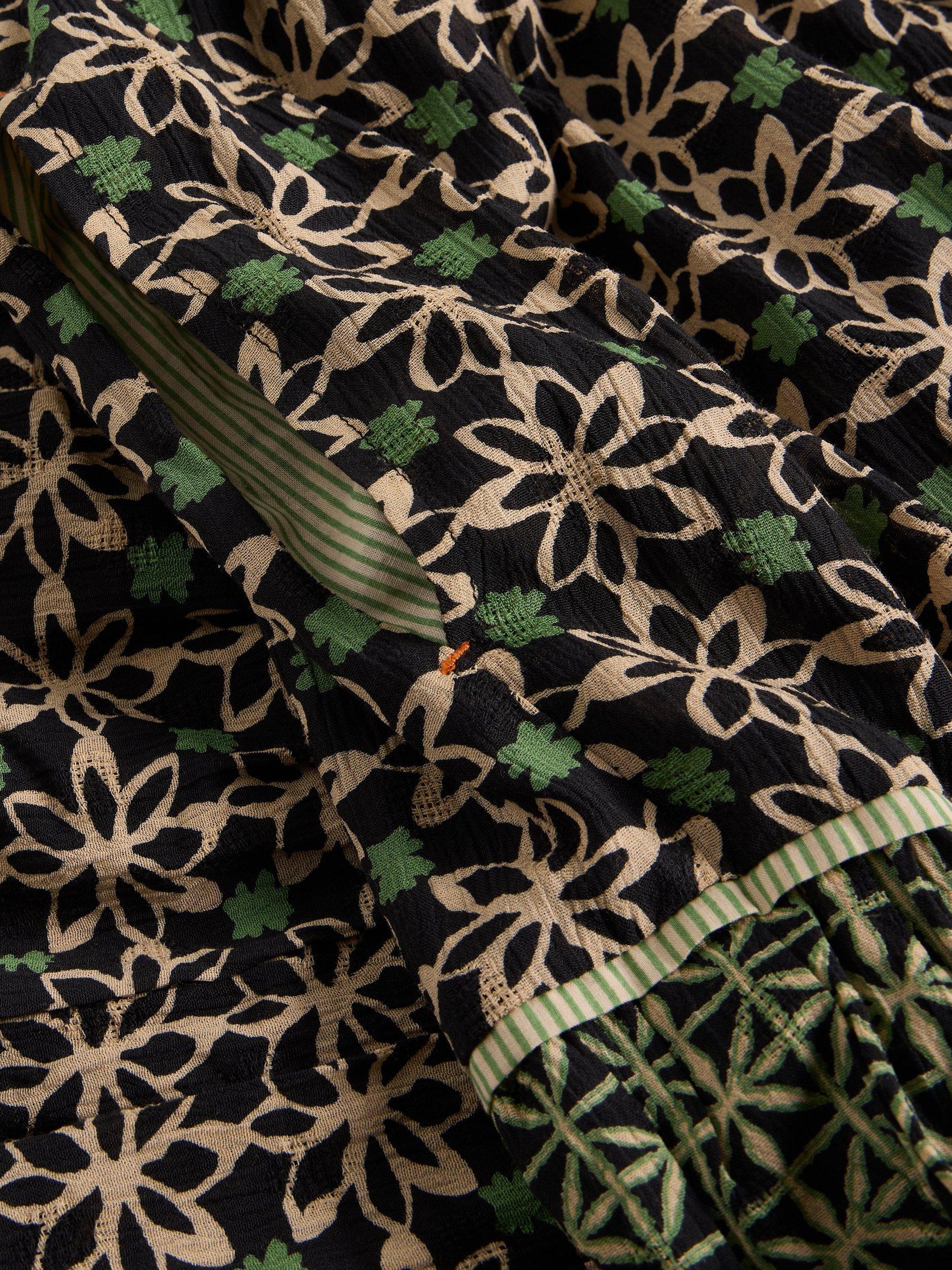 Product image 6 of 6, which shows White Stuff Mabel Tiered Midi Skirt containing LENZING™ ECOVERO™ Viscose, Black/Multi, 6