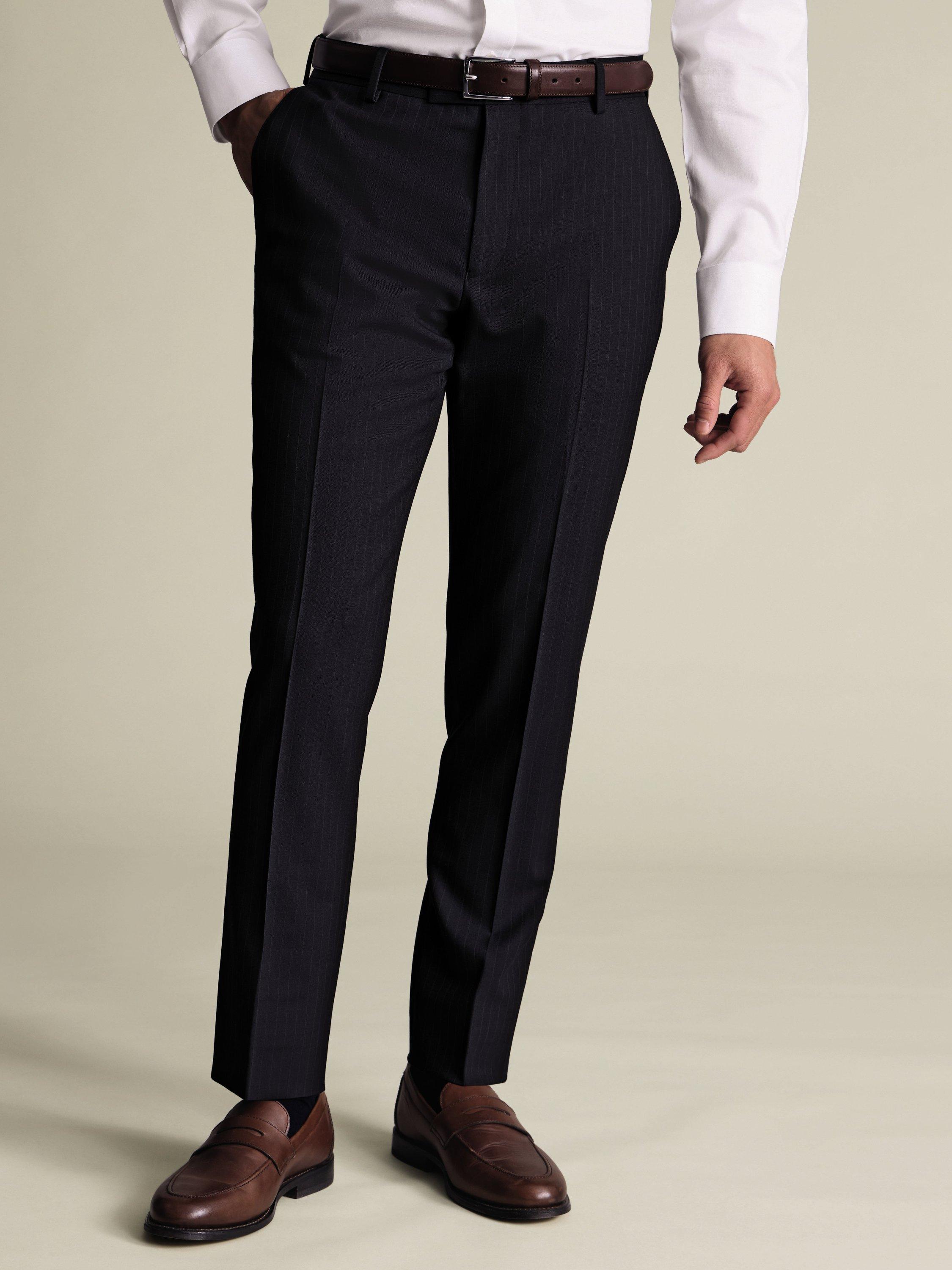 Product image 1 of 4, which shows Charles Tyrwhitt Pinstripe Wool Blend Trousers, Navy Stripe, 30S